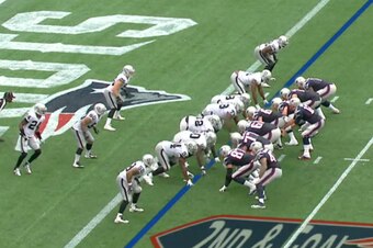 Charles Woodson (No. 24 on the very left) prepares for the Patriots' snap.