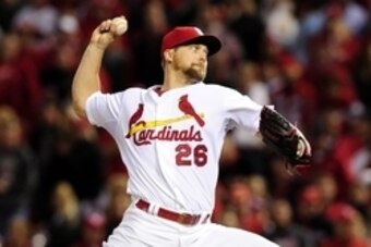 Oct 6, 2014; St. Louis, MO, USA; St. Louis Cardinals relief pitcher Trevor Rosenthal (26) pitches during the ninth inning against the Los Angeles Dodgers in game three of the 2014 NLDS baseball playoff game at Busch Stadium. Mandatory Credit: Jeff Curry-U