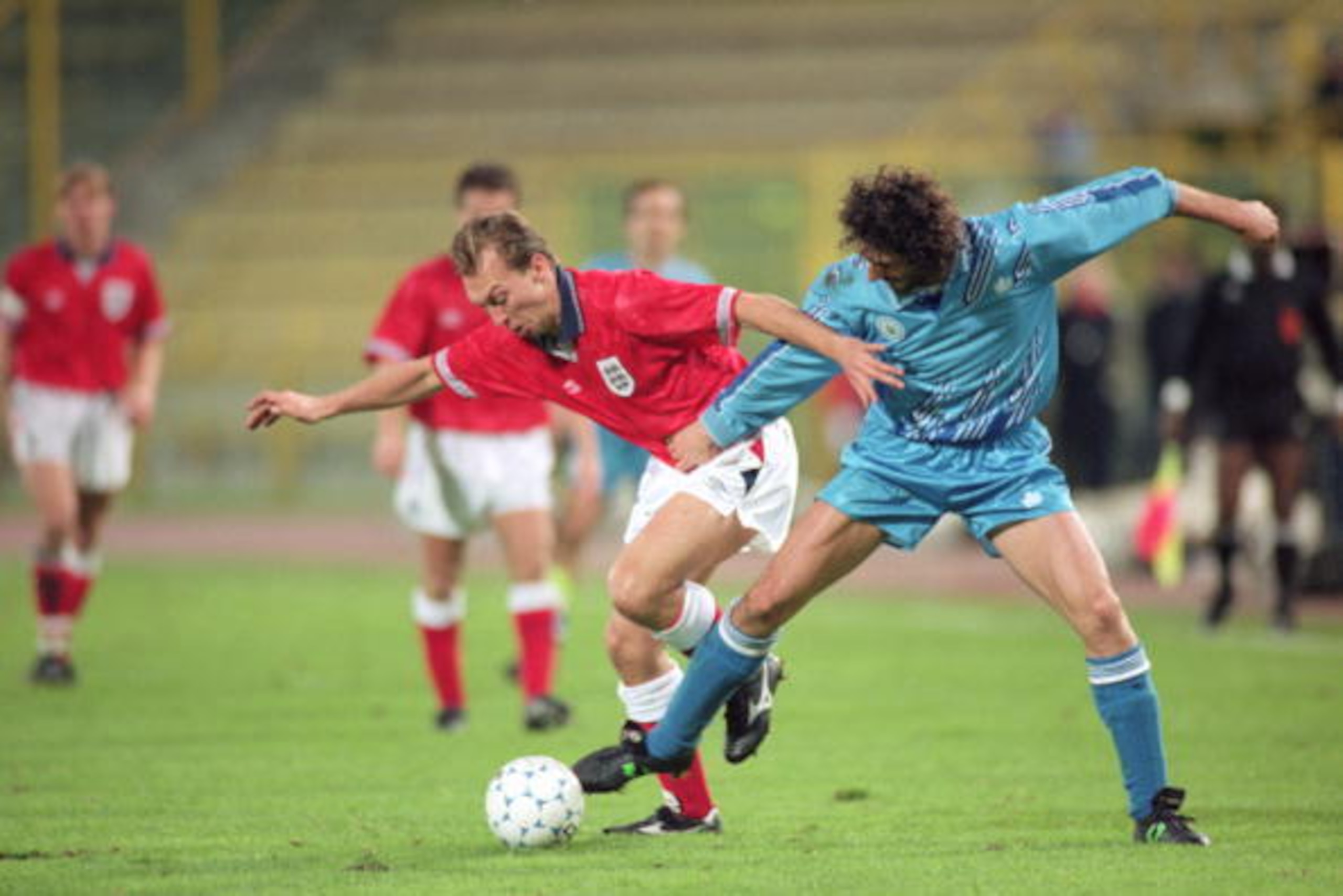 David Platt of England and Zanotti of San Marino during a World Cup qualifier match between San Marino and England, 17th November 1993. England won 1-7. (Photo by Shaun Botterill/Getty Images)