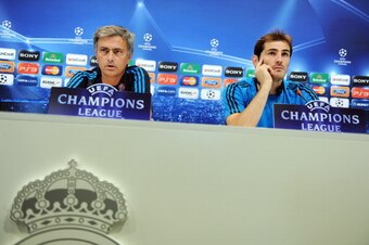 MADRID, SPAIN - OCTOBER 17:  Head coach Jose Mourinho (L) of Real Madrid and goalkeeper Iker Casillas listen to questions from the media during a press conference ahead of their UEFA Champions League group D match against Lyon at the Valdebebas training g