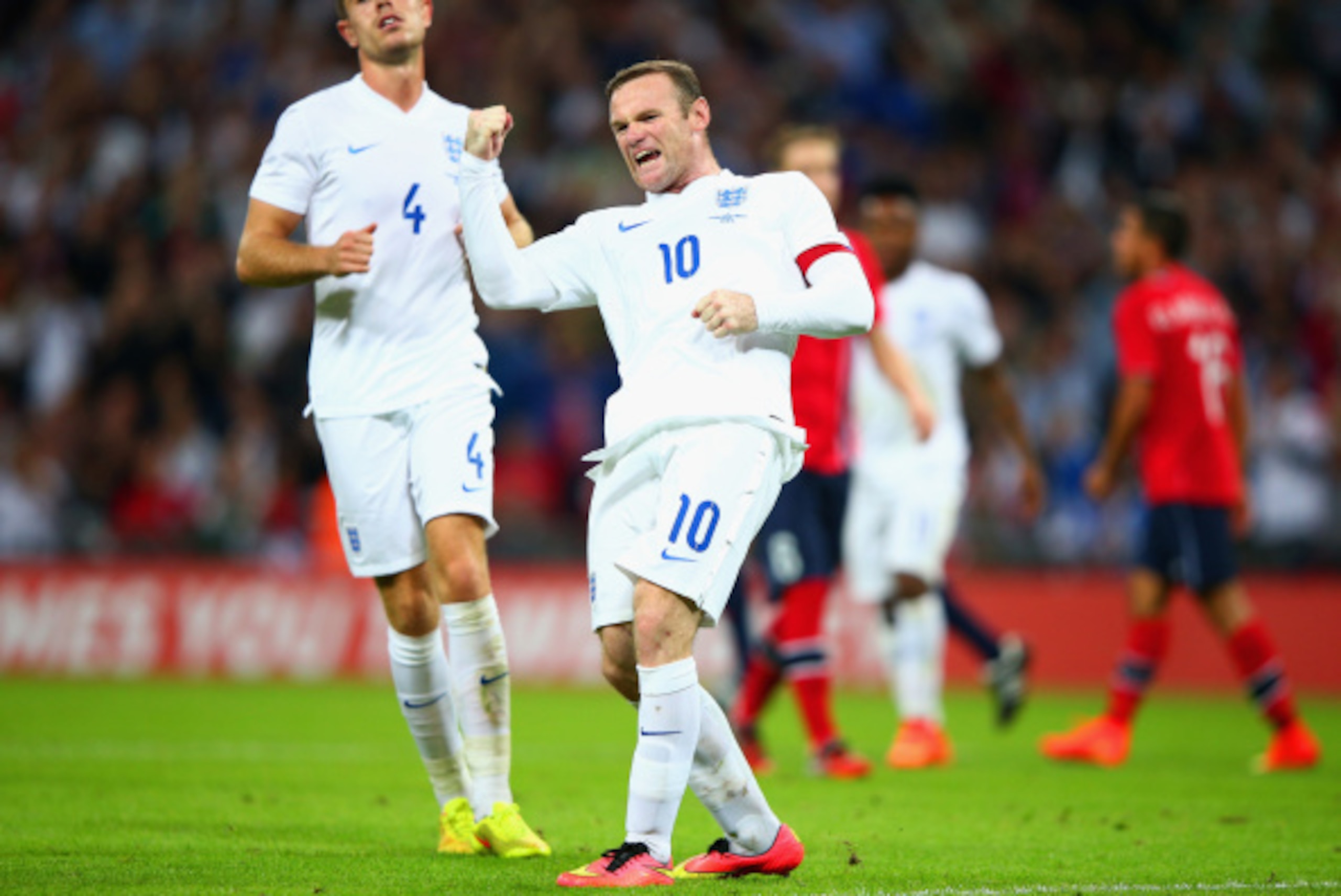 LONDON, ENGLAND - SEPTEMBER 03:  Wayne Rooney of England celebrates after scoring a goal from the penalty spot during the International friendly match between England and Norway at Wembley Stadium on September 3, 2014 in London, England.  (Photo by Ian Wa