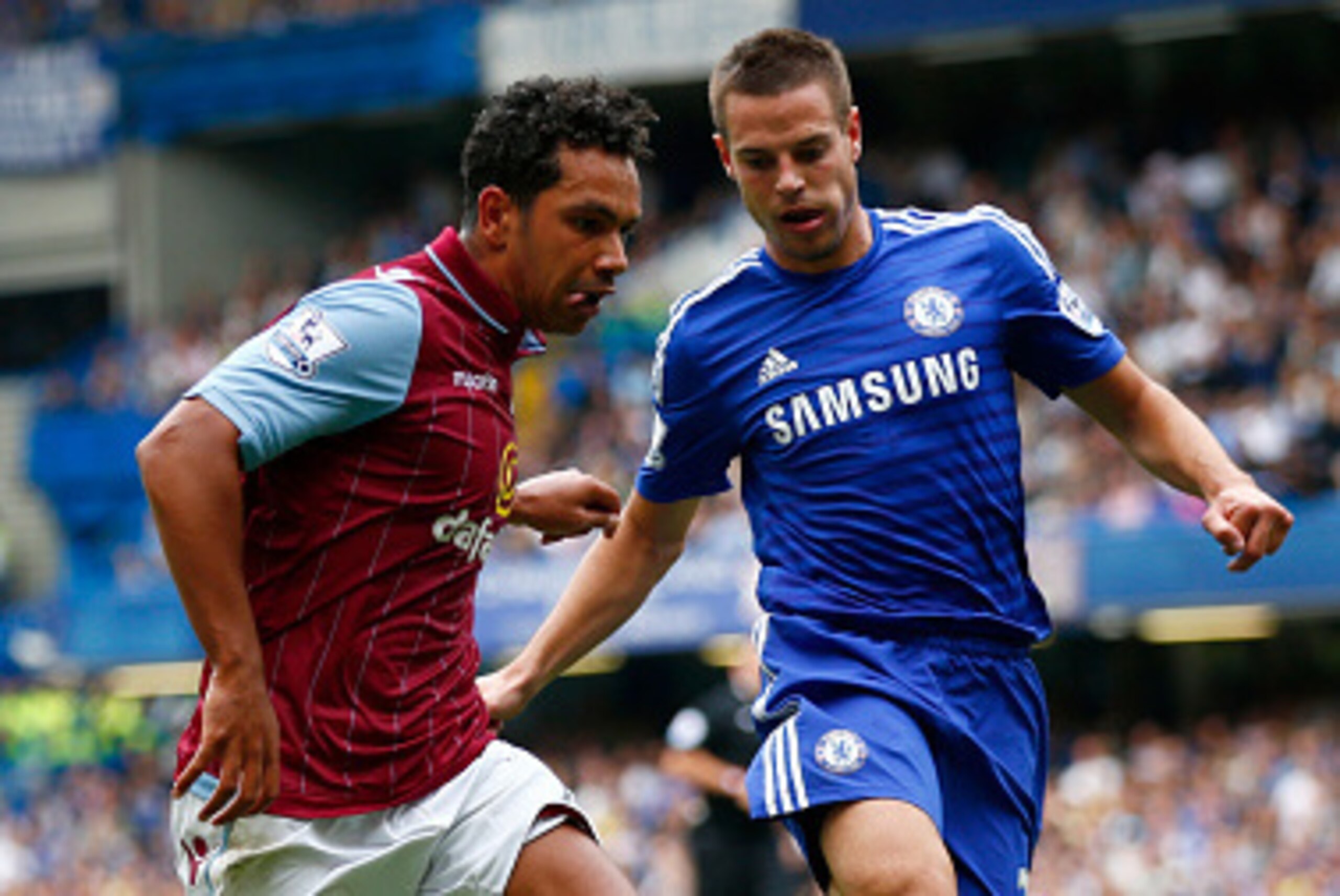 LONDON, ENGLAND - SEPTEMBER 27:  Kieran Richardson of Aston Villa is tracked by Cesar Azpilicueta of Chelsea during the Barclays Premier League match between Chelsea and Aston Villa at Stamford Bridge on September 27, 2014 in London, England  (Photo by Cl