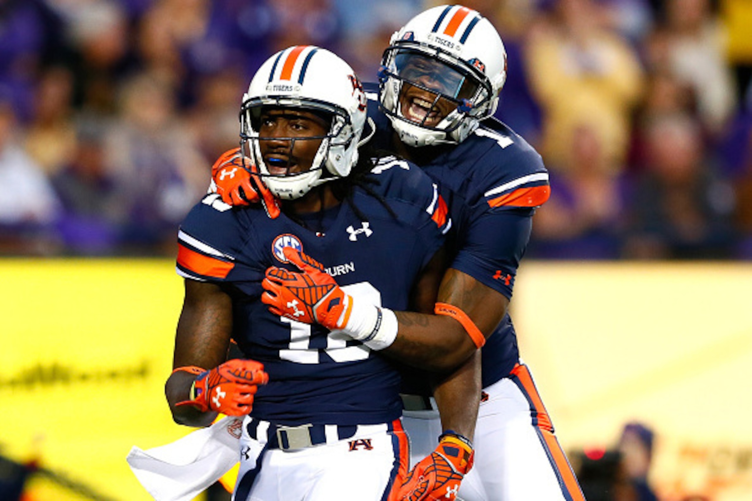 AUBURN, AL - OCTOBER 04:  Sammie Coates #18 of the Auburn Tigers reacts after pulling in a reception for a touchdown against the LSU Tigers with D'haquille Williams #1 at Jordan Hare Stadium on October 4, 2014 in Auburn, Alabama.  (Photo by Kevin C. Cox/G