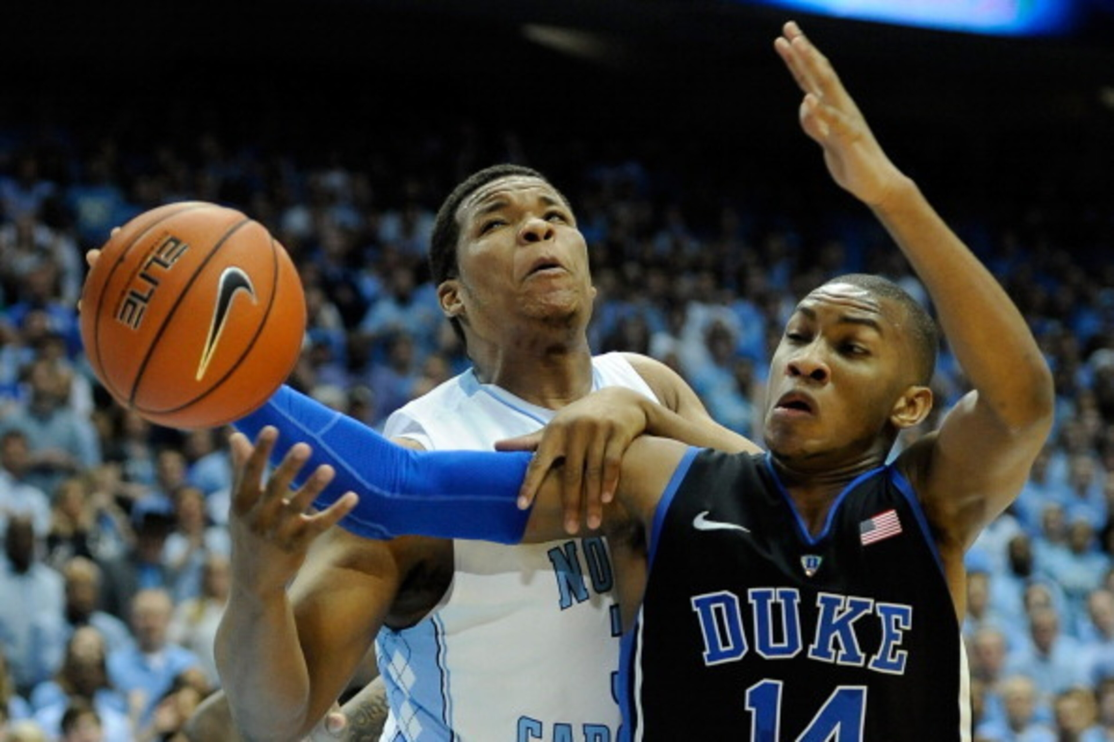 CHAPEL HILL, NC - FEBRUARY 20:  Kennedy Meeks #3 of the North Carolina Tar Heels battles Rasheed Sulaimon #14 of the Duke Blue Devils for a rebound during their game at the Dean Smith Center on February 20, 2014 in Chapel Hill, North Carolina.  (Photo by 