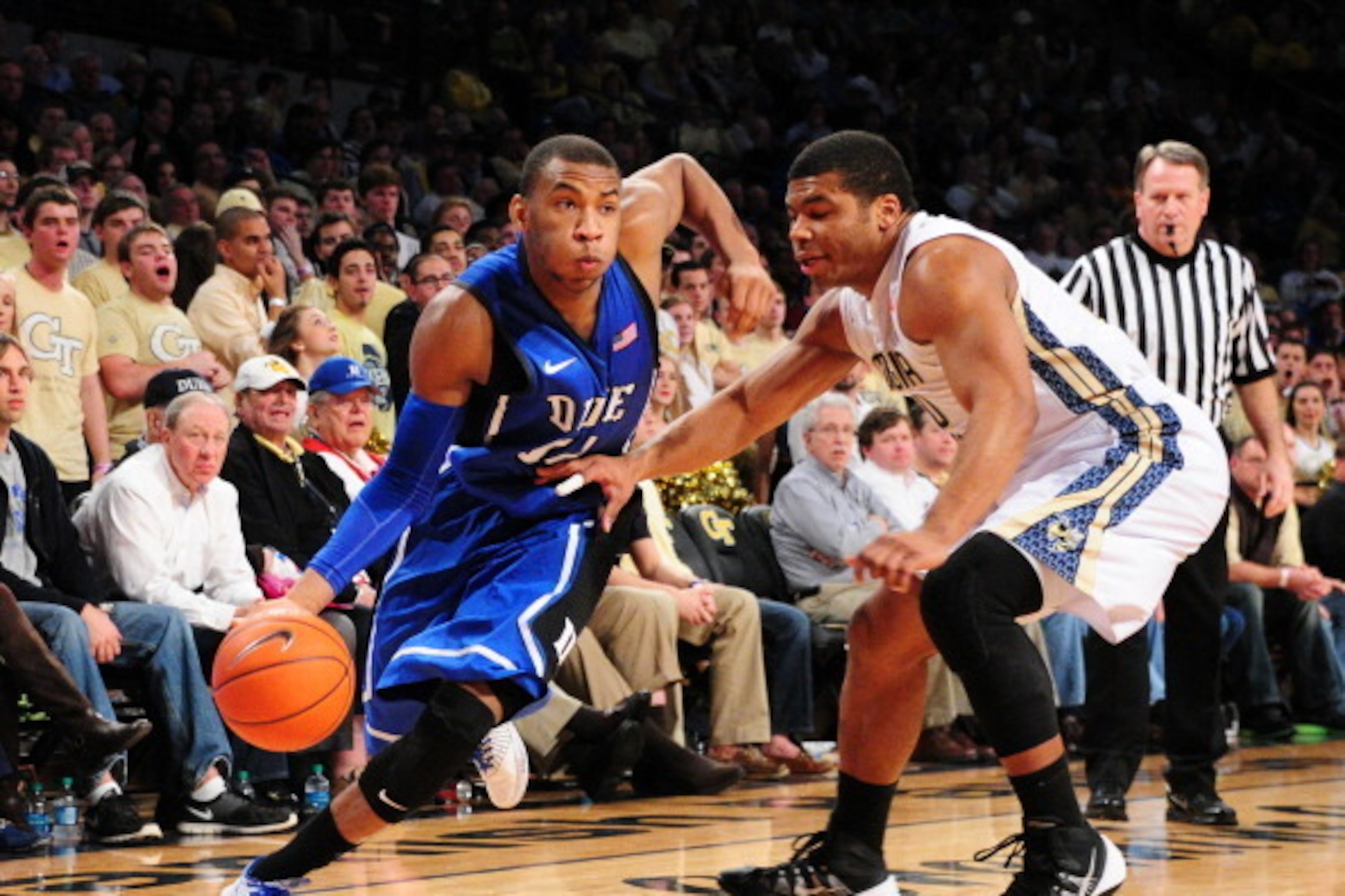 ATLANTA, GA - FEBRUARY 18: Rasheed Sulaimon #14 of the Duke Blue Devils drives against Corey Heyward #30 of the Georgia Tech Yellow Jackets at McCamish Pavilion on February 18, 2014 in Atlanta, Georgia. (Photo by Scott Cunningham/Getty Images)