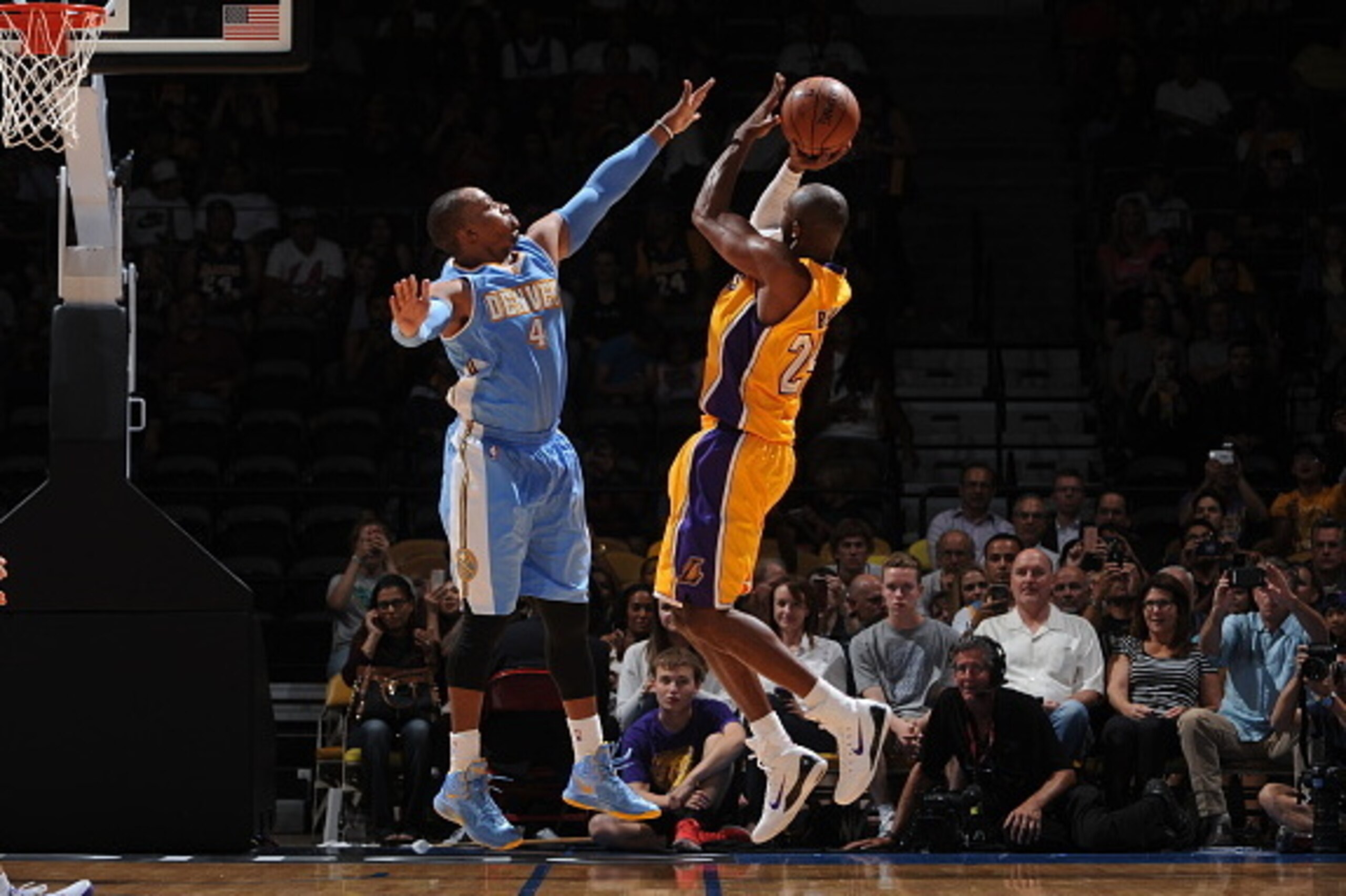 SAN DIEGO, CA- OCTOBER 6: Kobe Bryant #24 of the Los Angeles Lakers shoots against Randy Foye #4 of the Denver Nuggets as the Los Angeles Lakers take on the Denver Nuggets at the Valley View Sports Arena in San Diego, California on October 6, 2014 . NOTE SAN DIEGO, CA- OCTOBER 6: Kobe Bryant #24 of the Los Angeles Lakers shoots against Randy Foye #4 of the Denver Nuggets as the Los Angeles Lakers take on the Denver Nuggets at the Valley View Sports Arena in San Diego, California on October 6, 2014 . NOTE