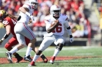 Oct 4, 2014; College Park, MD, USA; Ohio State Buckeyes quarterback J.T. Barrett (16) runs with the ball during the second quarter against the Maryland Terrapins at Byrd Stadium. Mandatory Credit: Tommy Gilligan-USA TODAY Sports