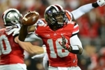 Sep 6, 2014; Columbus, OH, USA; Ohio State Buckeyes quarterback J.T. Barrett (16) looks to pass during the second quarter against the Virginia Tech Hokies at Ohio Stadium. Mandatory Credit: Andrew Weber-USA TODAY Sports