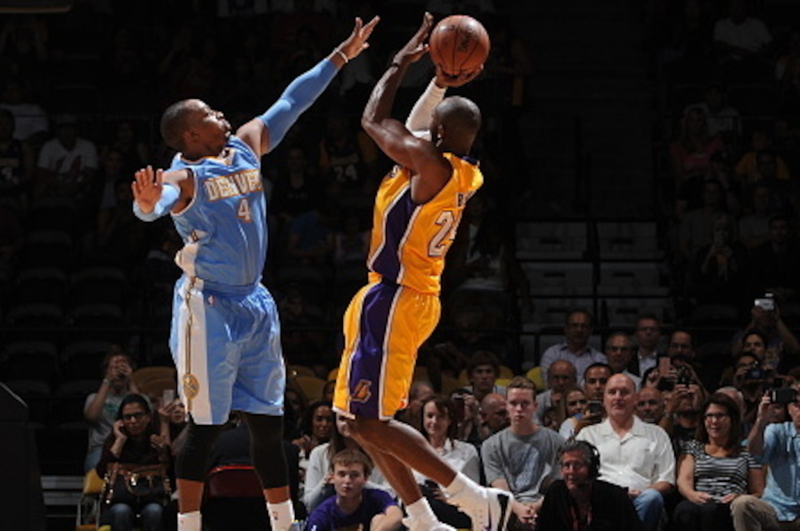SAN DIEGO, CA- OCTOBER 6: Kobe Bryant #24 of the Los Angeles Lakers shoots against Randy Foye #4 of the Denver Nuggets as the Los Angeles Lakers take on the Denver Nuggets at the Valley View Sports Arena in San Diego, California on October 6, 2014 . NOTE 