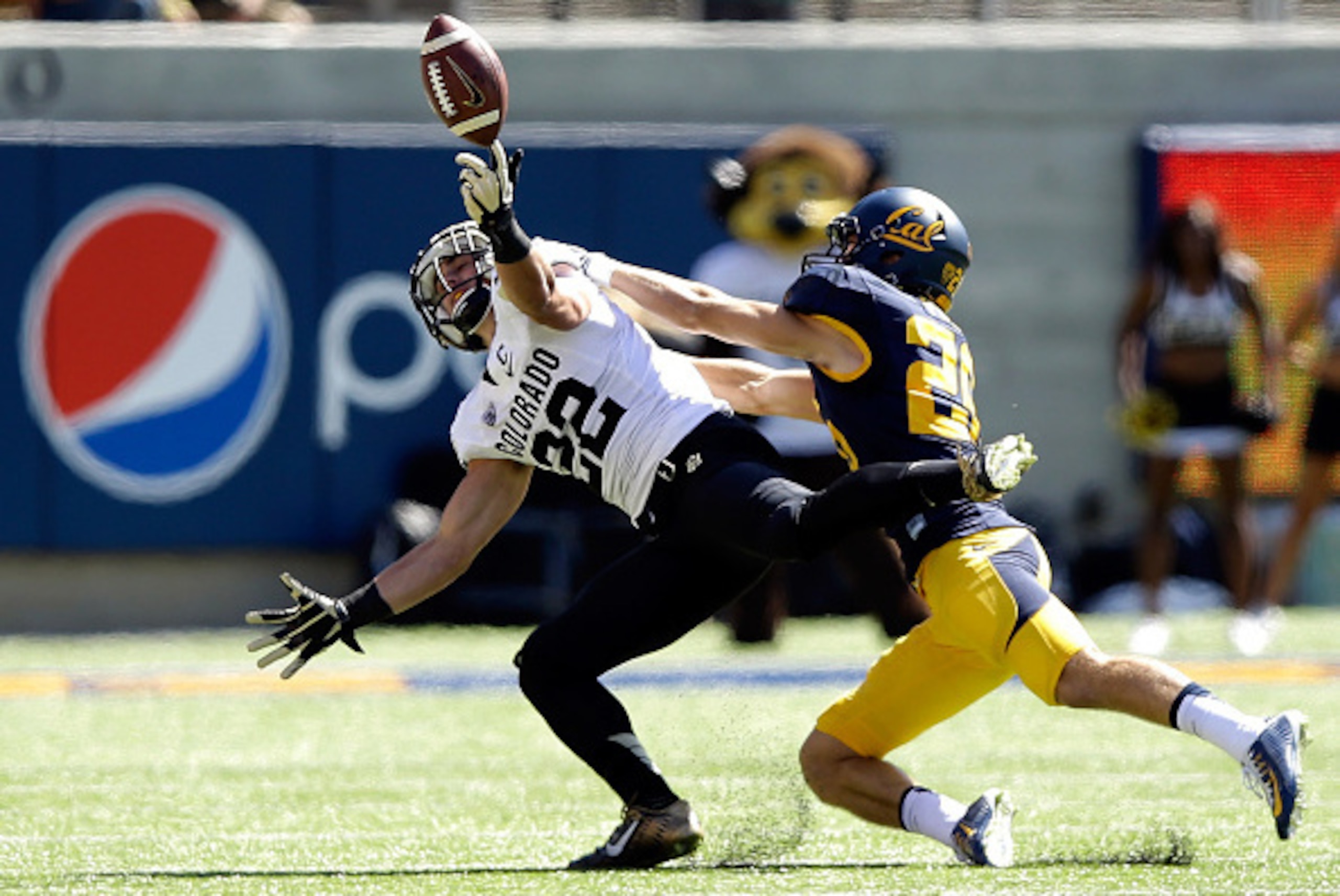 BERKELEY, CA - SEPTEMBER 27: Nelson Spruce #22 of the Colorado Buffaloes can not catch a pass while defended by Griffin Piatt #26 of the California Golden Bears at California Memorial Stadium on September 27, 2014 in Berkeley, California. (Photo by Ezra BERKELEY, CA - SEPTEMBER 27: Nelson Spruce #22 of the Colorado Buffaloes can not catch a pass while defended by Griffin Piatt #26 of the California Golden Bears at California Memorial Stadium on September 27, 2014 in Berkeley, California. (Photo by Ezra