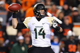 STILLWATER, OK - NOVEMBER 23:  Bryce Petty #14 of the Baylor Bears looks to pass in the second quarter against the Oklahoma State Cowboys at Boone Pickens Stadium on November 23, 2013 in Stillwater, Oklahoma.  (Photo by Ronald Martinez/Getty Images)