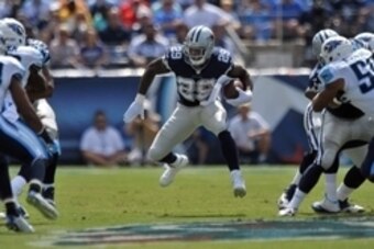 Sep 14, 2014; Nashville, TN, USA; Dallas Cowboys running back DeMarco Murray (29) rushes against the Tennessee Titans during the first half at LP Field. Mandatory Credit: Jim Brown-USA TODAY Sports