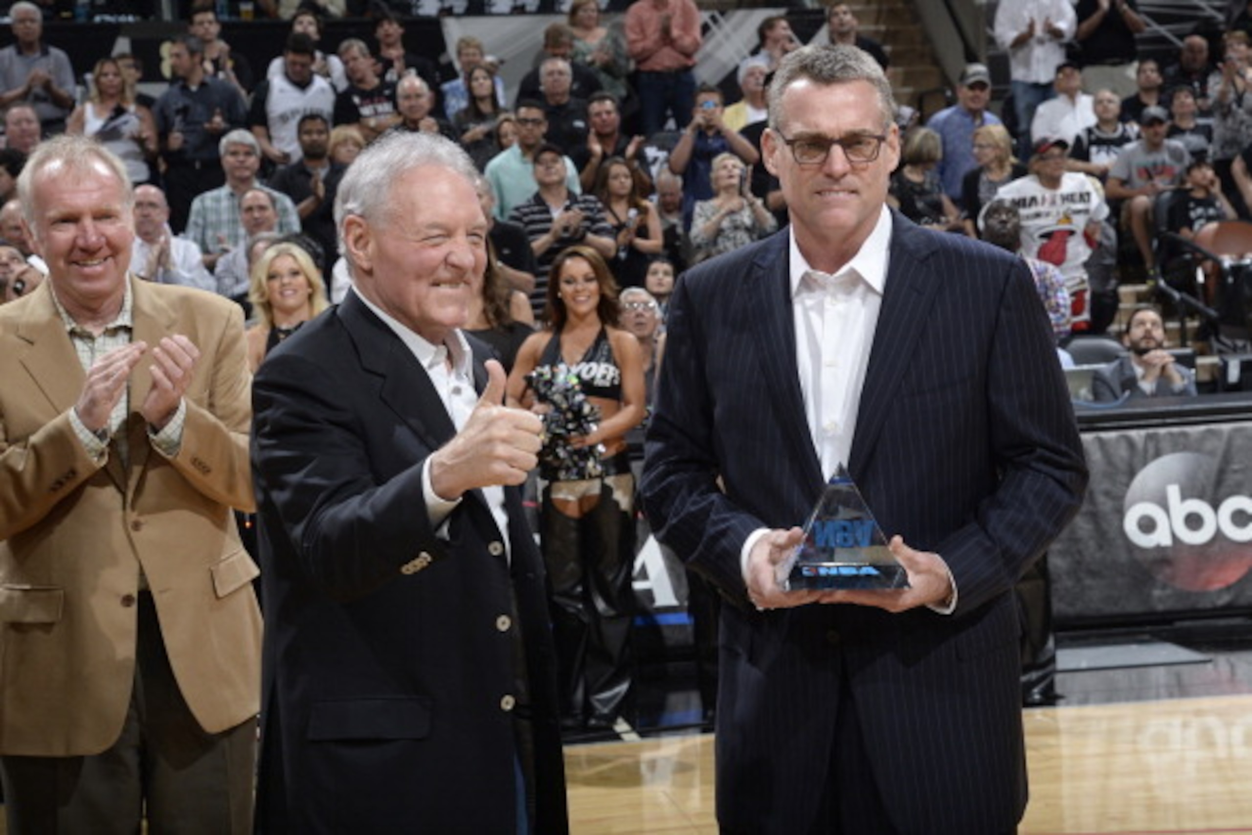 SAN ANTONIO, TX - May 8:   R.C. Buford receives the NBA Executive of the Year award before before the San Antonio Spurs Game Two of the Western Conference Semifinals against the Portland Trail Blazers at AT&T Center on May 8, 2014 in San Antonio, Texas. N