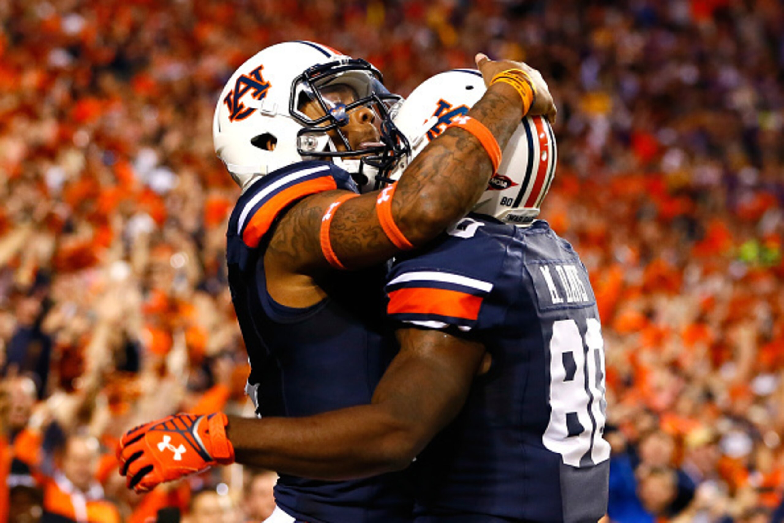 AUBURN, AL - OCTOBER 04:  Nick Marshall #14 of the Auburn Tigers reacts after scoring a touchdown against the LSU Tigers with Marcus Davis #80 at Jordan Hare Stadium on October 4, 2014 in Auburn, Alabama.  (Photo by Kevin C. Cox/Getty Images)
