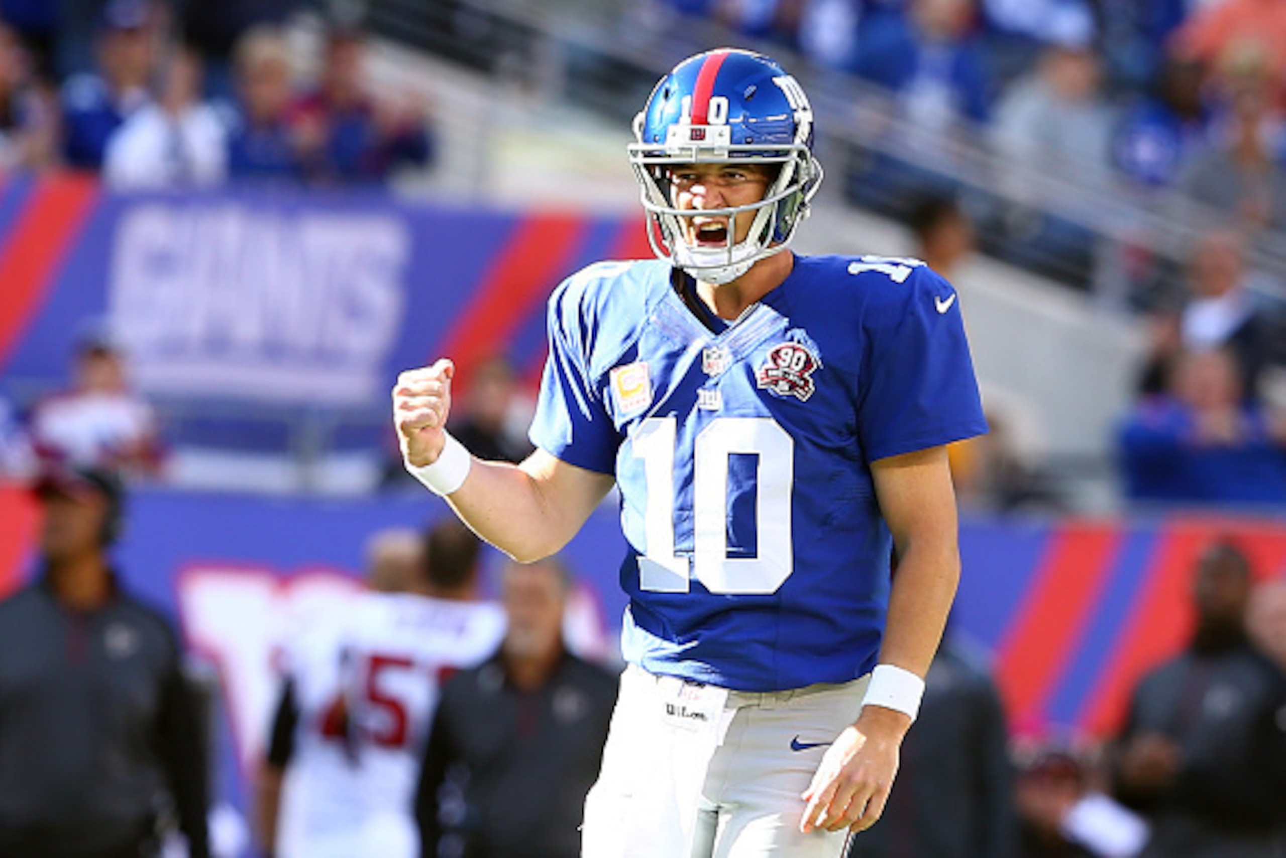 EAST RUTHERFORD, NJ - OCTOBER 05:  Quarterback Eli Manning #10 of the New York Giants celebrates a play in the fourth quarter against the Atlanta Falcons during their game at MetLife Stadium on October 5, 2014 in East Rutherford, New Jersey.  (Photo by El