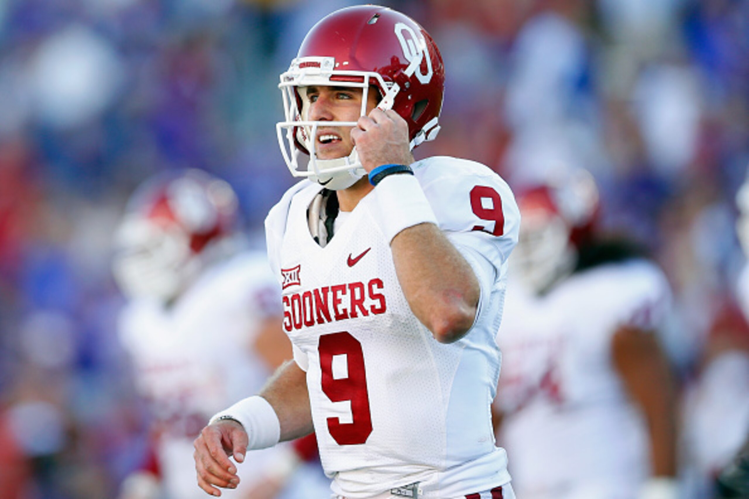 FORT WORTH, TX - OCTOBER 04:  Quarterback Trevor Knight #9 of the Oklahoma Sooners walks off the field against the TCU Horned Frogs defense in the second half at Amon G. Carter Stadium on October 4, 2014 in Fort Worth, Texas.  (Photo by Tom Pennington/Get