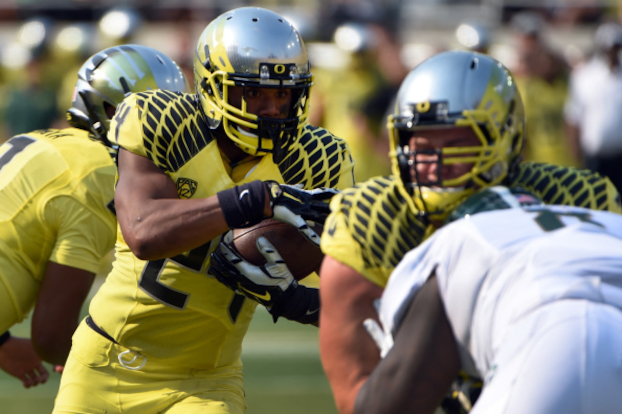 EUGENE, OR -SEPTEMBER 06; Running back Thomas Tyner #24 of the Oregon Ducks runs the ball in for a touchdown in the first quarter of the game against the Michigan State Spartans at Autzen Stadium on September 6, 2014 in Eugene, Oregon. (Photo by Steve Dyk EUGENE, OR -SEPTEMBER 06; Running back Thomas Tyner #24 of the Oregon Ducks runs the ball in for a touchdown in the first quarter of the game against the Michigan State Spartans at Autzen Stadium on September 6, 2014 in Eugene, Oregon. (Photo by Steve Dyk