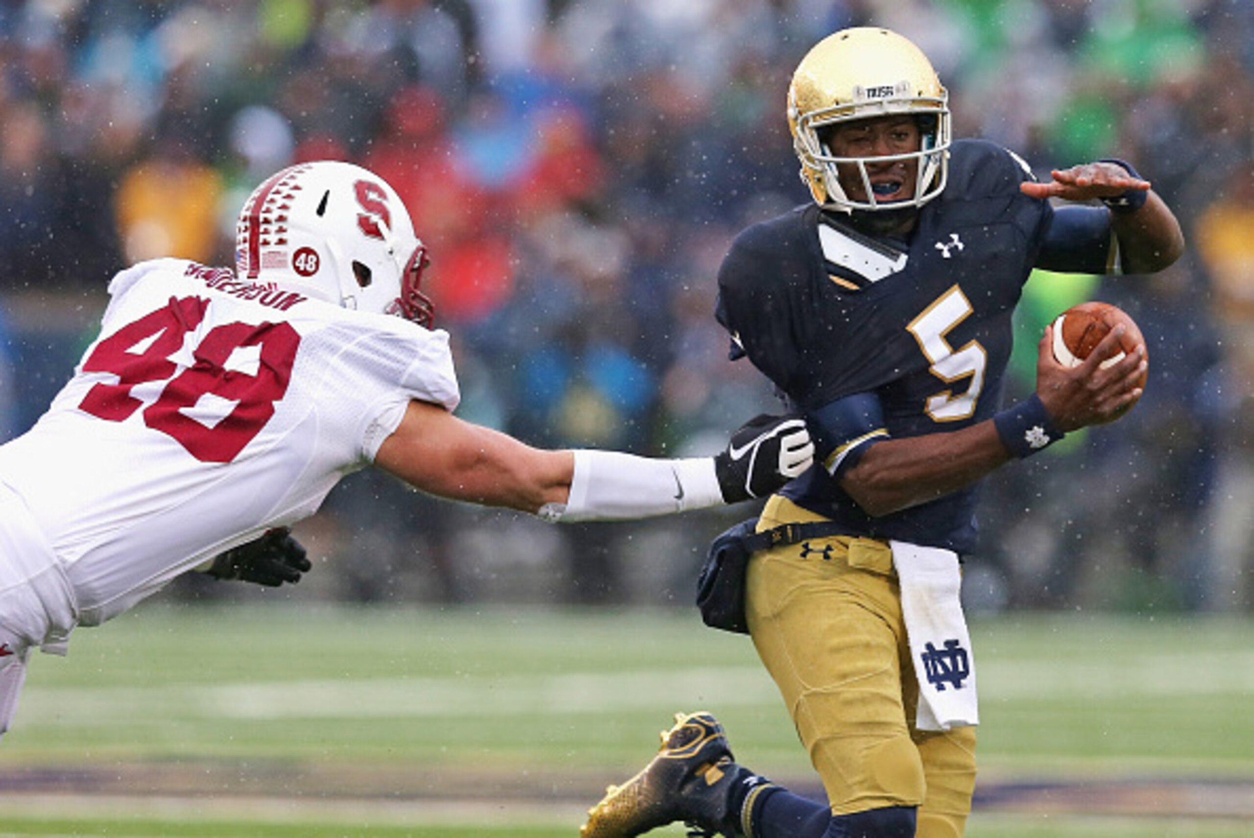 SOUTH BEND, IN - OCTOBER 04: Everett Golson #5 of the Notre Dame Fighting Irish breaks away from Kevin Anderson #48 of the Standford Cardinal at Notre Dame Stadium on October 4, 2014 in South Bend, Indiana. (Photo by Jonathan Daniel/Getty Images) SOUTH BEND, IN - OCTOBER 04: Everett Golson #5 of the Notre Dame Fighting Irish breaks away from Kevin Anderson #48 of the Standford Cardinal at Notre Dame Stadium on October 4, 2014 in South Bend, Indiana. (Photo by Jonathan Daniel/Getty Images)