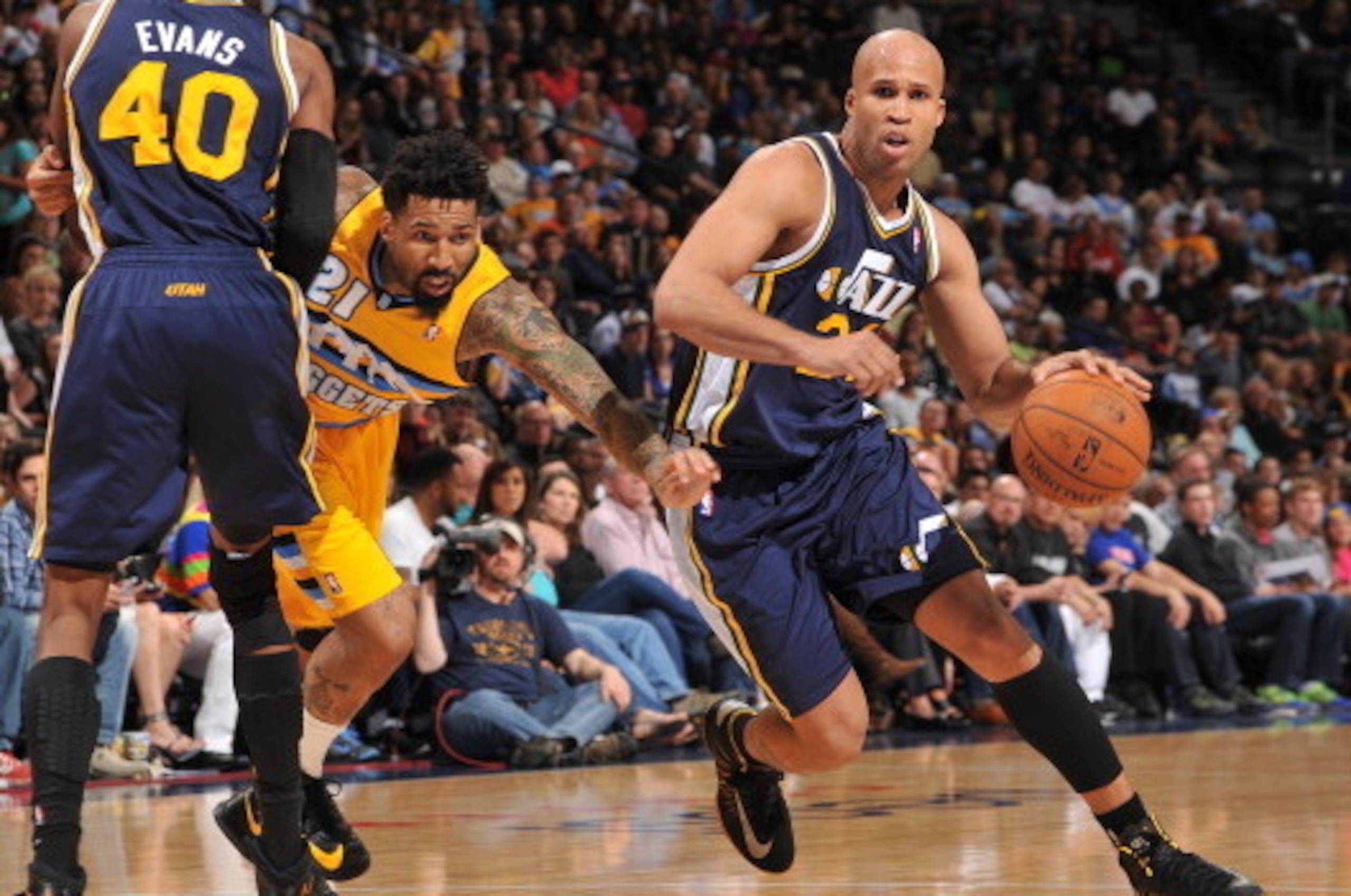 DENVER, CO - April 12: Richard Jefferson #24 of the Utah Jazz drives against the Denver Nuggets on April 12, 2014 at the Pepsi Center in Denver, Colorado. NOTE TO USER: User expressly acknowledges and agrees that, by downloading and/or using this Photogra