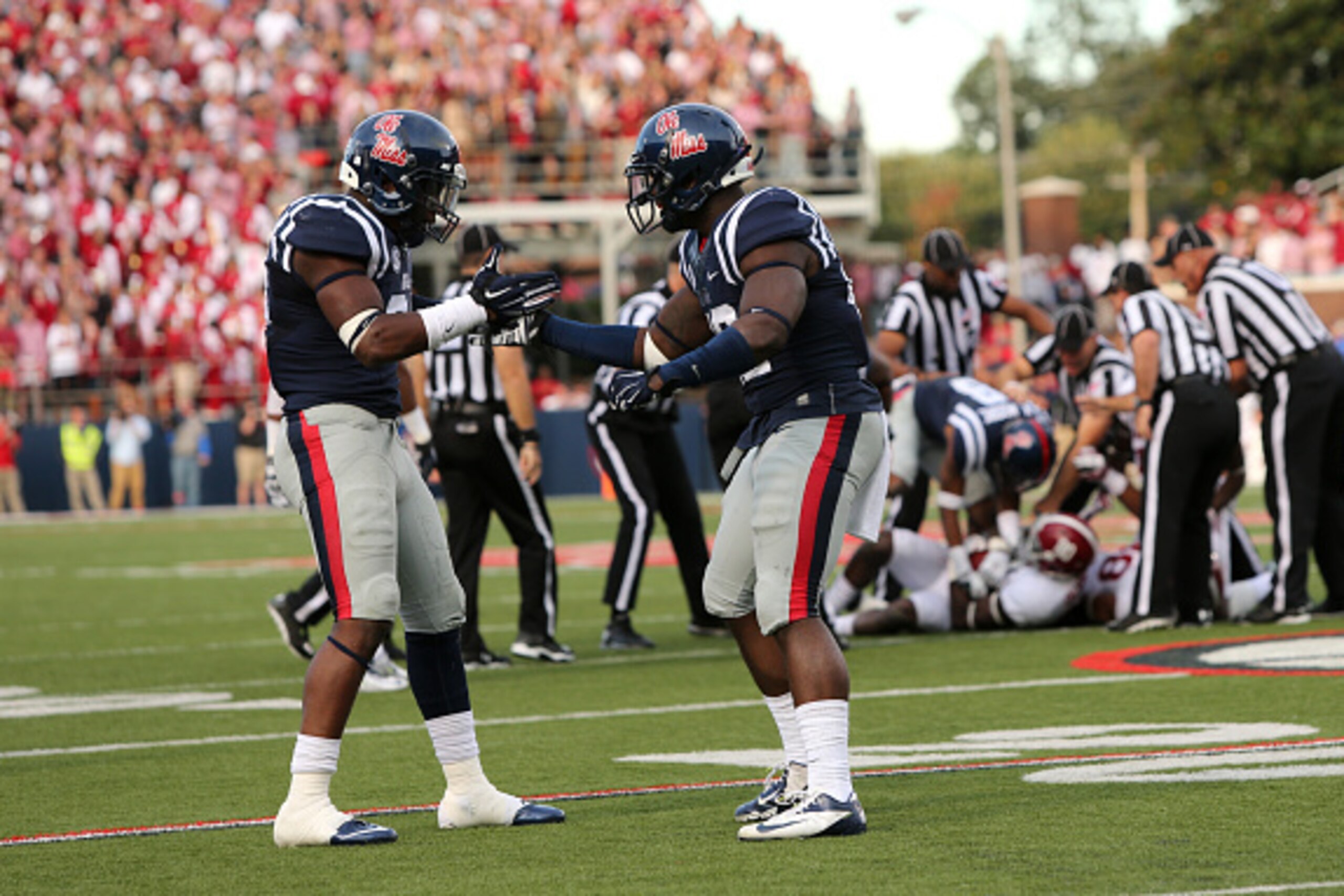 OXFORD, MS - OCTOBER 4: Keith Lewis #24 and LaKedrick King #28 of the Ole Miss Rebels celebrate a fumble recovery against the Alabama Crimson Tide on OCTOBER 4, 2014 at Vaught-Hemingway Stadium in Oxford, Mississippi. Mississippi beat Alabama 23-17. (Phot OXFORD, MS - OCTOBER 4: Keith Lewis #24 and LaKedrick King #28 of the Ole Miss Rebels celebrate a fumble recovery against the Alabama Crimson Tide on OCTOBER 4, 2014 at Vaught-Hemingway Stadium in Oxford, Mississippi. Mississippi beat Alabama 23-17. (Phot