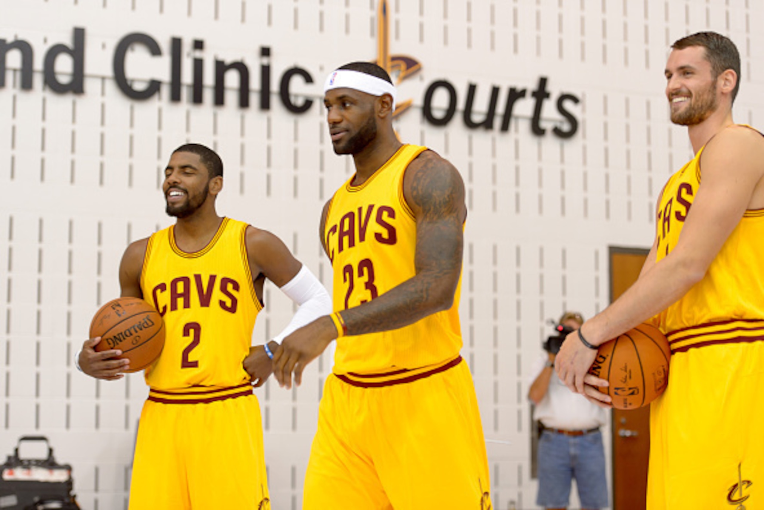 INDEPENDENCE, OH - SEPTEMBER 26: Kevin Love #0 Kyrie Irving #2 and LeBron James #23 of the Cleveland Cavaliers pose for a photo during media day at Cleveland Clinic Courts on September 26, 2014 in Independence, Ohio. (Photo by Jason Miller/Getty Images)