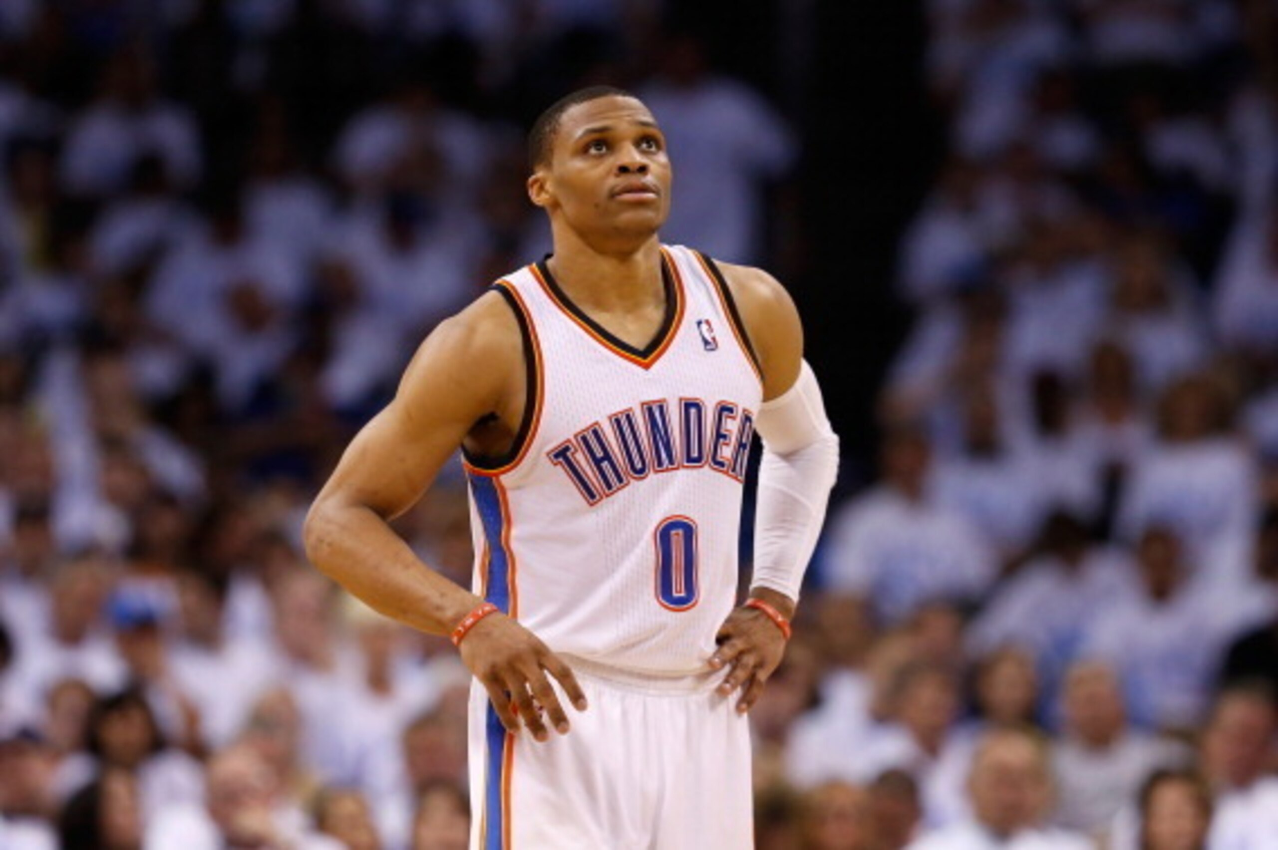 OKLAHOMA CITY, OK - MAY 31:  Russell Westbrook #0 of the Oklahoma City Thunder waits on the court in the second half against the San Antonio Spurs during Game Six of the Western Conference Finals of the 2014 NBA Playoffs at Chesapeake Energy Arena on May 