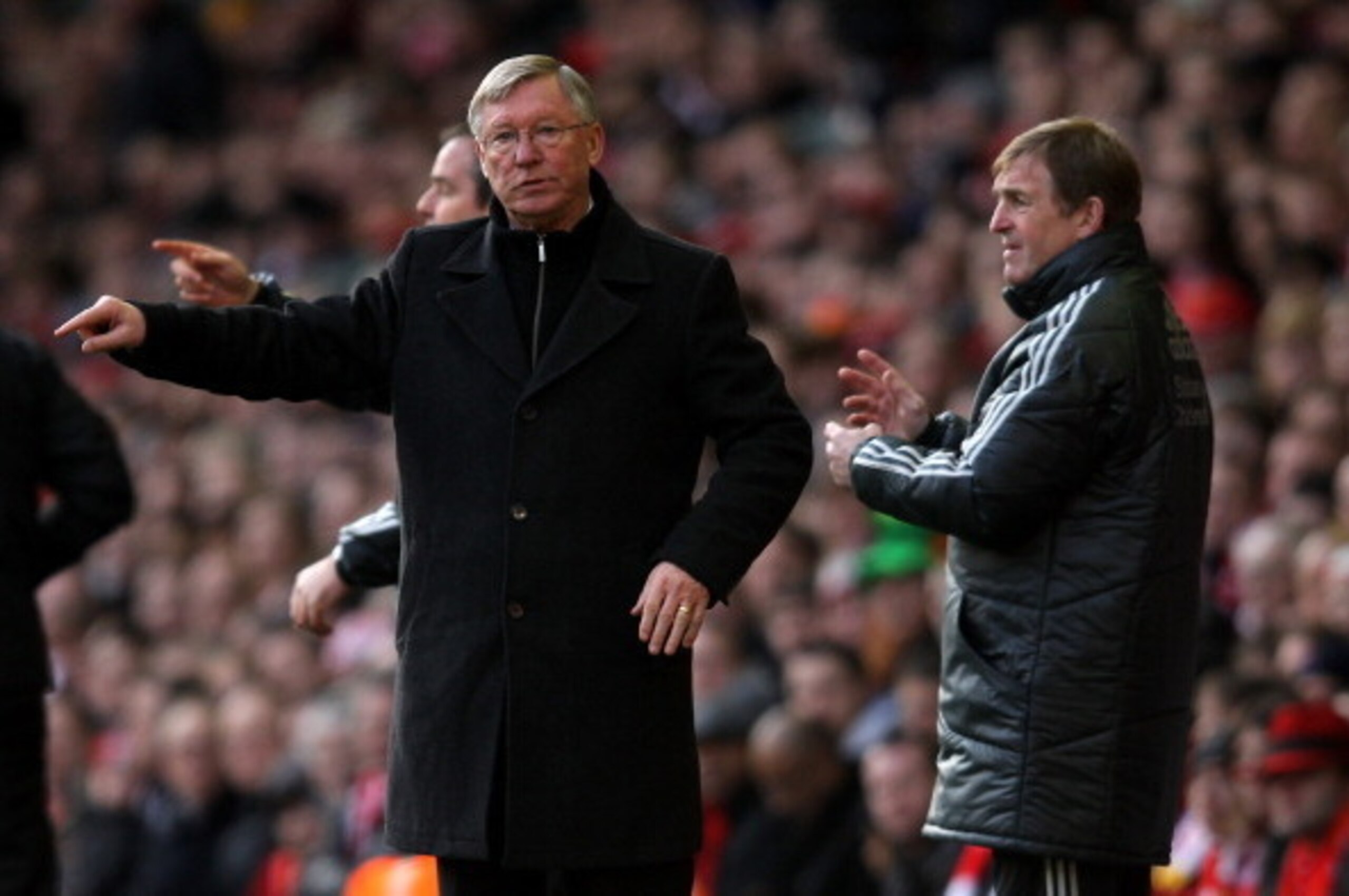 LIVERPOOL, ENGLAND - JANUARY 28:  Manchester United Manager Sir Alex Ferguson gestures as Liverpool Manager Kenny Dalglish (R) looks on during the FA Cup Fourth Round match between Liverpool and Manchester United at Anfield on January 28, 2012 in Liverpoo