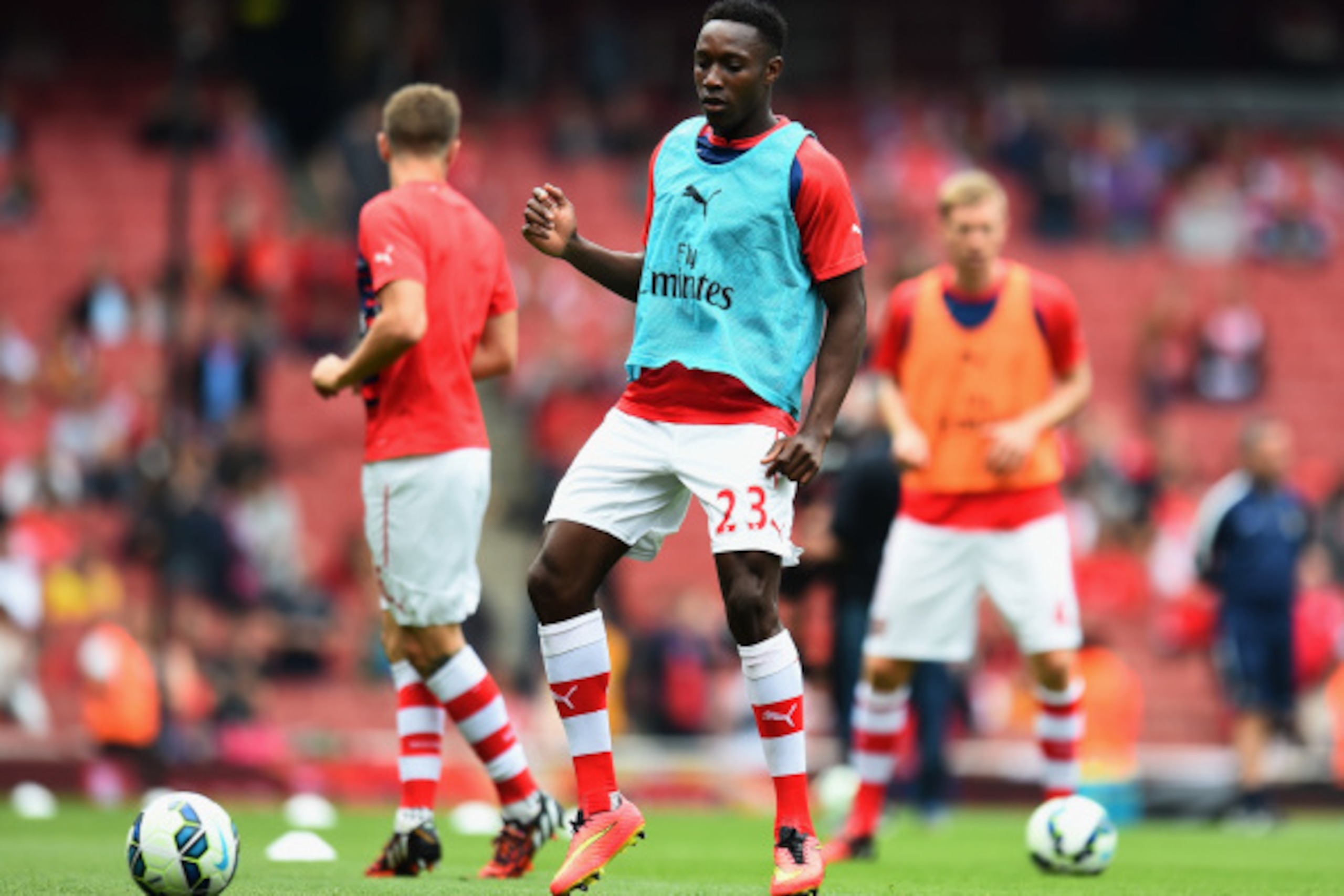 LONDON, ENGLAND - SEPTEMBER 13:  Danny Welbeck of Arsenal warms up during the Barclays Premier League match between Arsenal and Manchester City at Emirates Stadium on September 13, 2014 in London, England.  (Photo by Shaun Botterill/Getty Images)