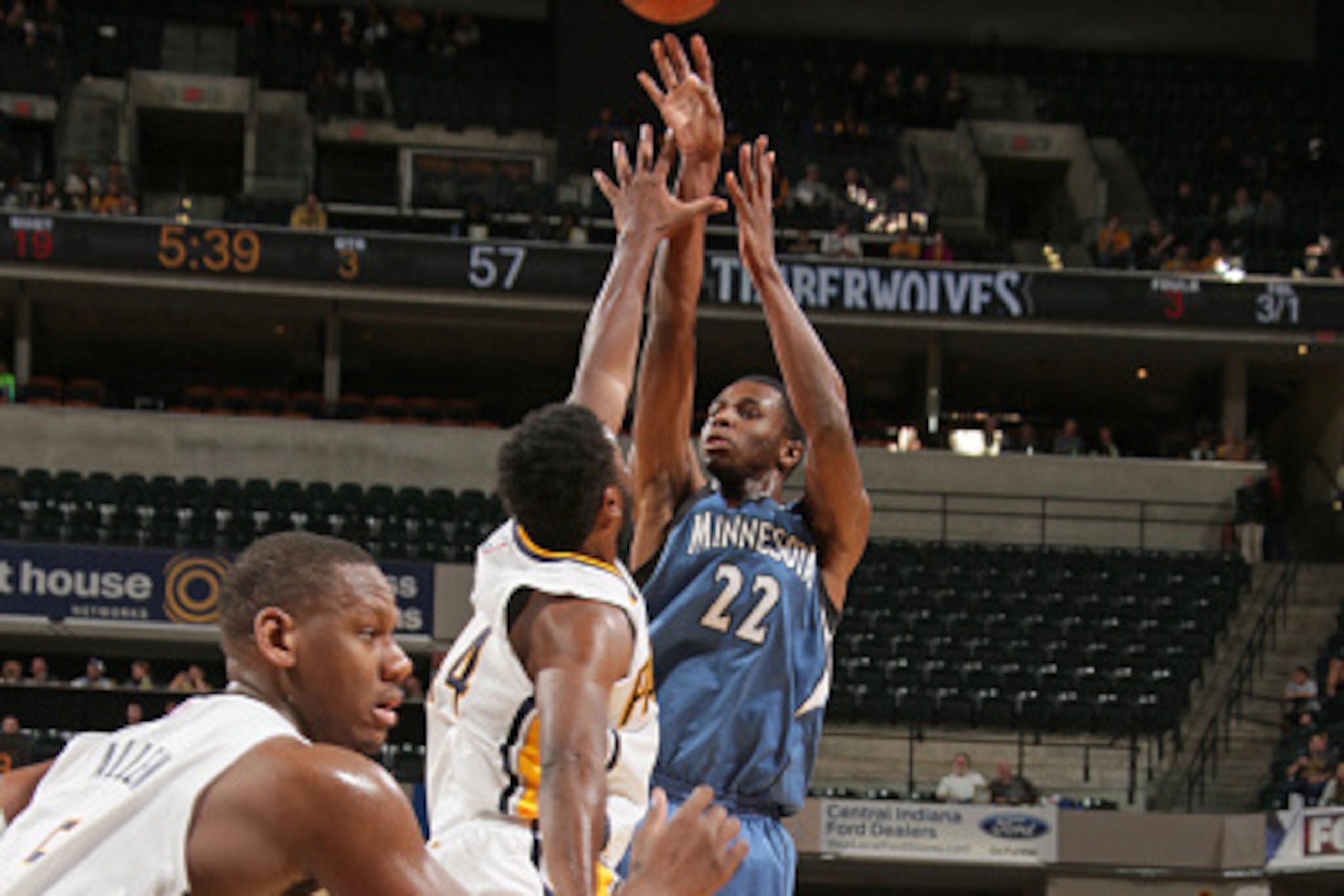 INDIANAPOLIS, IN - OCT 7:  Andrew Wiggins #22 of the Minnesota Timberwolves shoots the ball against the Indiana Pacers at Bankers Life Fieldhouse on October 7, 2014 in Indianapolis, Indiana. NOTE TO USER: User expressly acknowledges and agrees that, by do