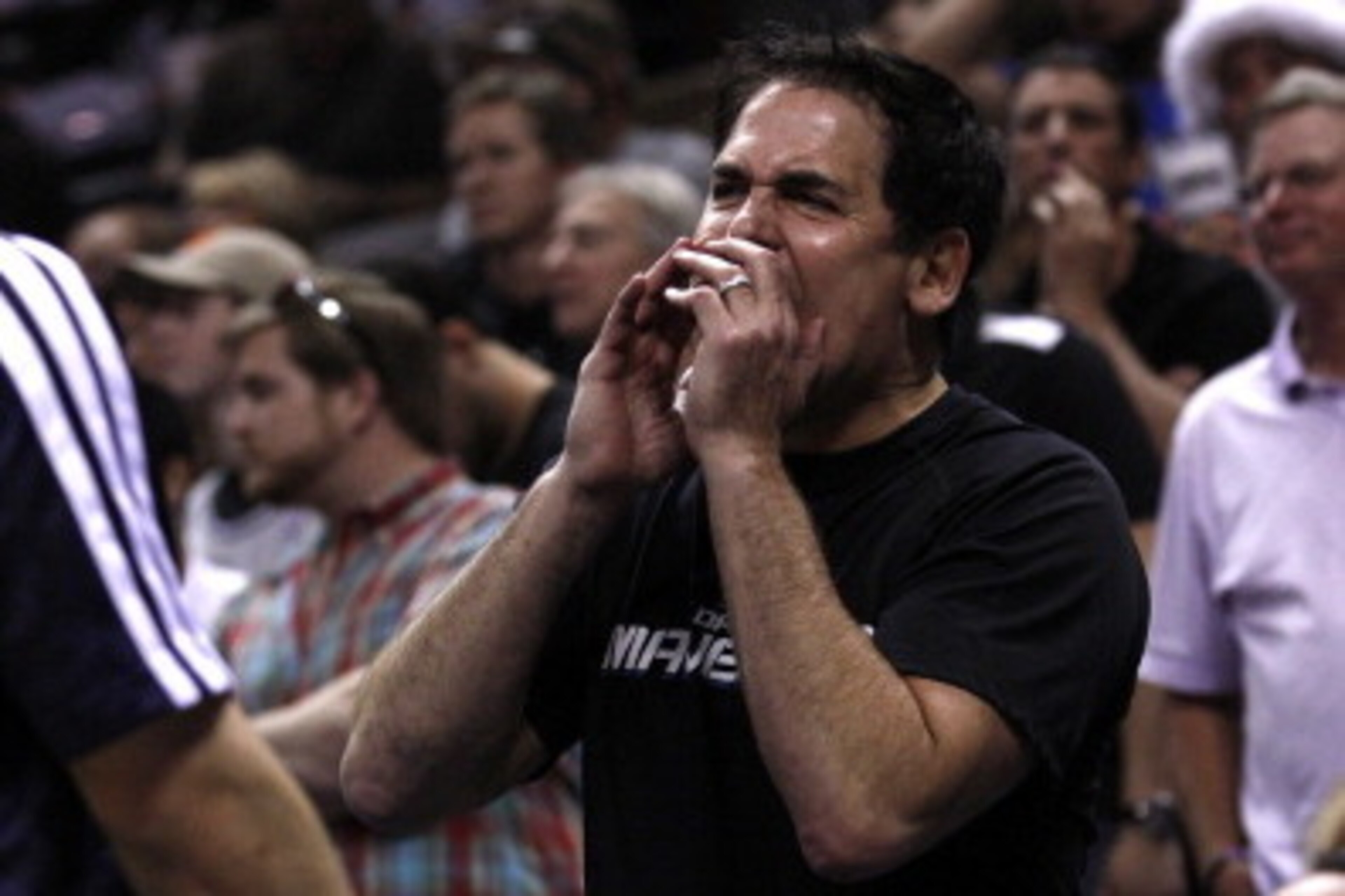 SAN ANTONIO, TX - MAY 4:  Owner Mark Cuban of the Dallas Mavericks yells his displeasure with a foul call as his team plays the San Antonio Spurs in Game Seven of the Western Conference Quarterfinals during the 2014 NBA Playoffs at the AT&T Center on May 