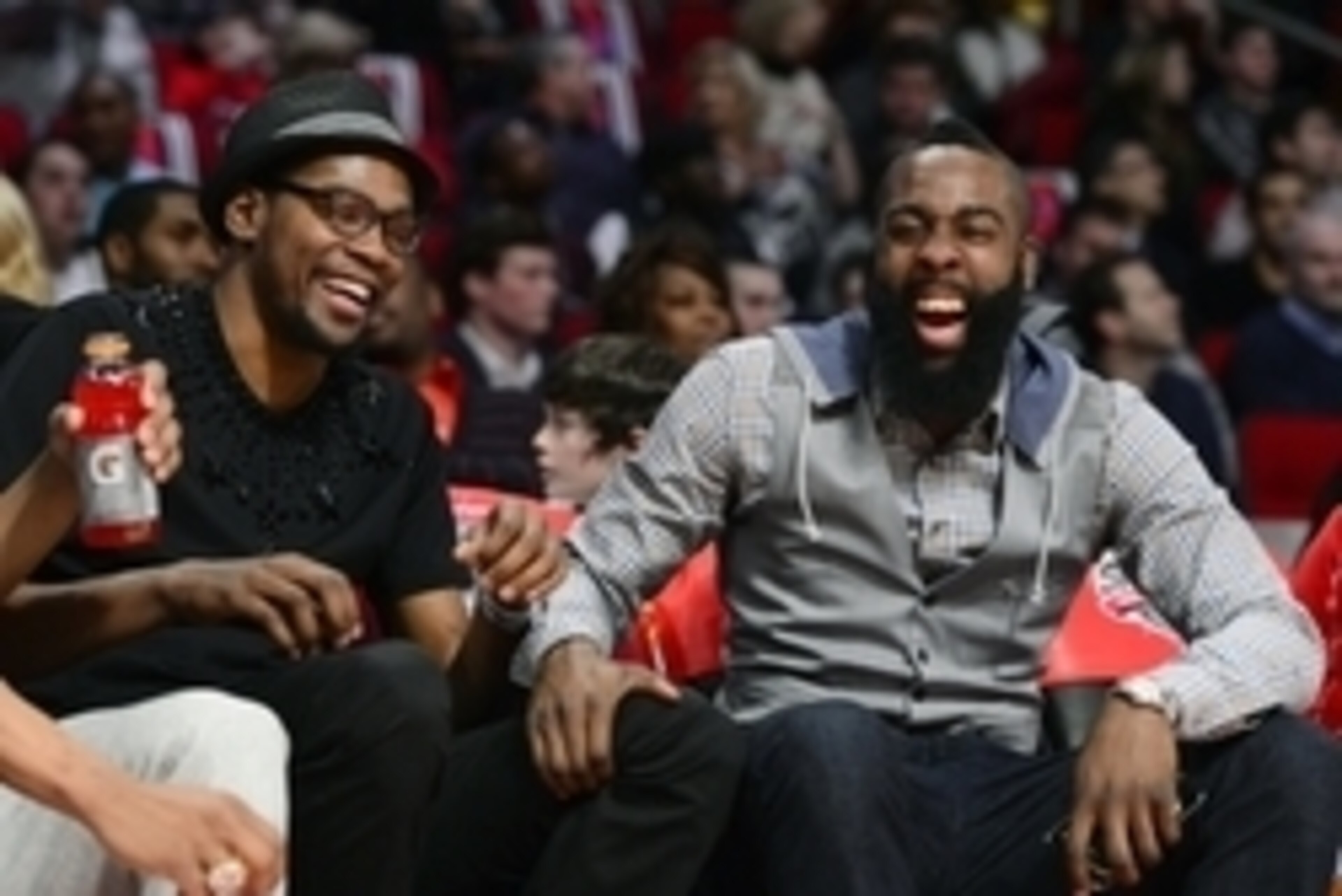 Feb 16, 2013; Houston, TX, USA; Western Conference forward Kevin Durant (left) of the Oklahoma City Thunder and Western Conference guard James Harden (right) of the Houston Rockets laugh during the 2013 NBA All-Star skills challenge at the Toyota Center. 