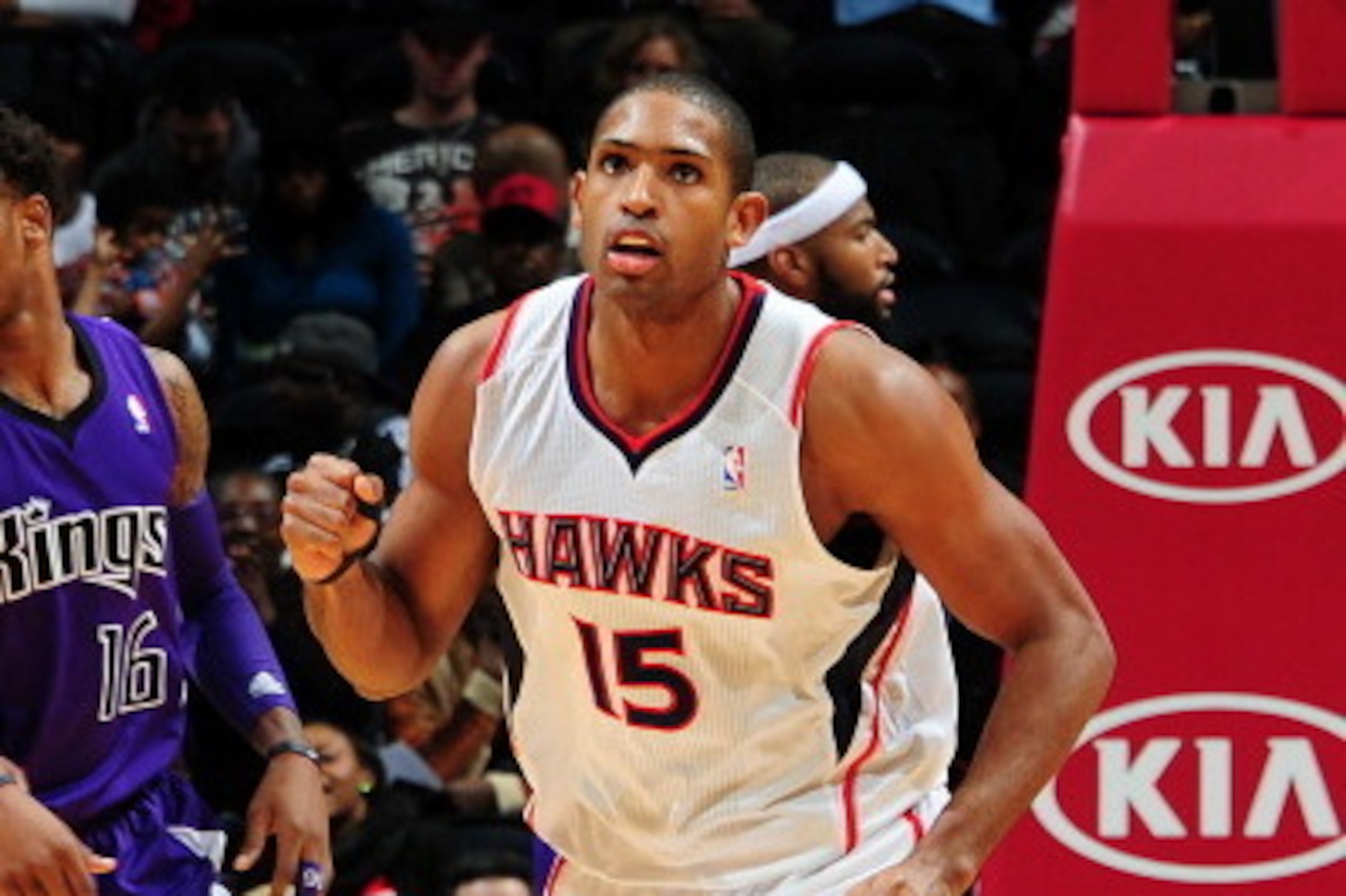 ATLANTA, GA - DECEMBER 18: Al Horford #15 of the Atlanta Hawks gets pumped up after the score against the Sacramento Kings on December 18, 2013 at Philips Arena in Atlanta, Georgia.  NOTE TO USER: User expressly acknowledges and agrees that, by downloadin