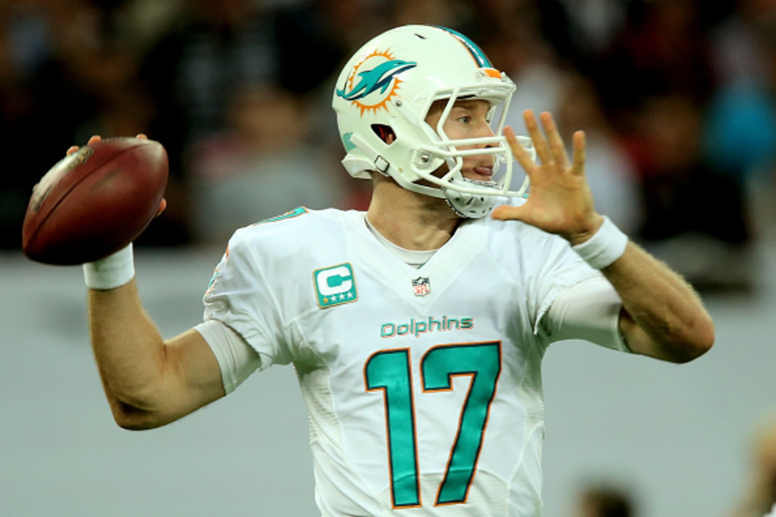 LONDON, ENGLAND - SEPTEMBER 28:  Ryan Tannehill #17 of the Miami Dolphins passes during the NFL match between the Oakland Raiders and the Miami Dolphins at Wembley Stadium on September 28, 2014 in London, England.  (Photo by Ben Hoskins/Getty Images)
