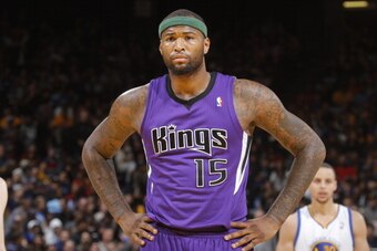 OAKLAND, CA - APRIL 4: DeMarcus Cousins #15 of the Sacramento Kings in a game against the Golden State Warriors on April 4, 2014 at Oracle Arena in Oakland, California. NOTE TO USER: User expressly acknowledges and agrees that, by downloading and or using