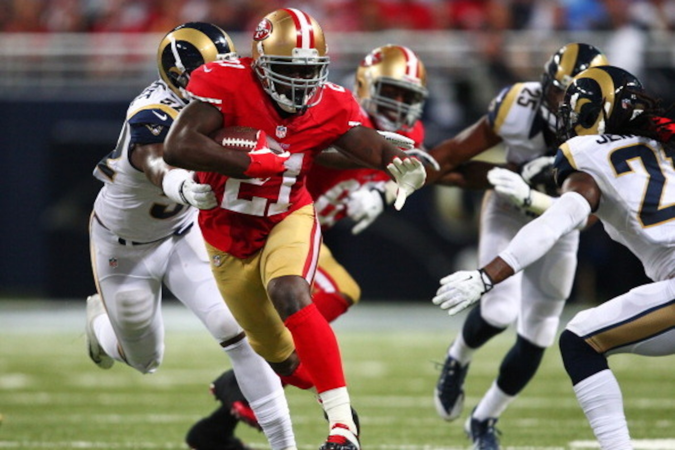 ST LOUIS, MO - SEPTEMBER 26:   Frank Gore #21 of the San Francisco 49ers runs for 17 yards against the St. Louis Rams in the second quarter at Edward Jones Dome on September 26, 2013 in St Louis, Missouri.  (Photo by Dilip Vishwanat/Getty Images)
