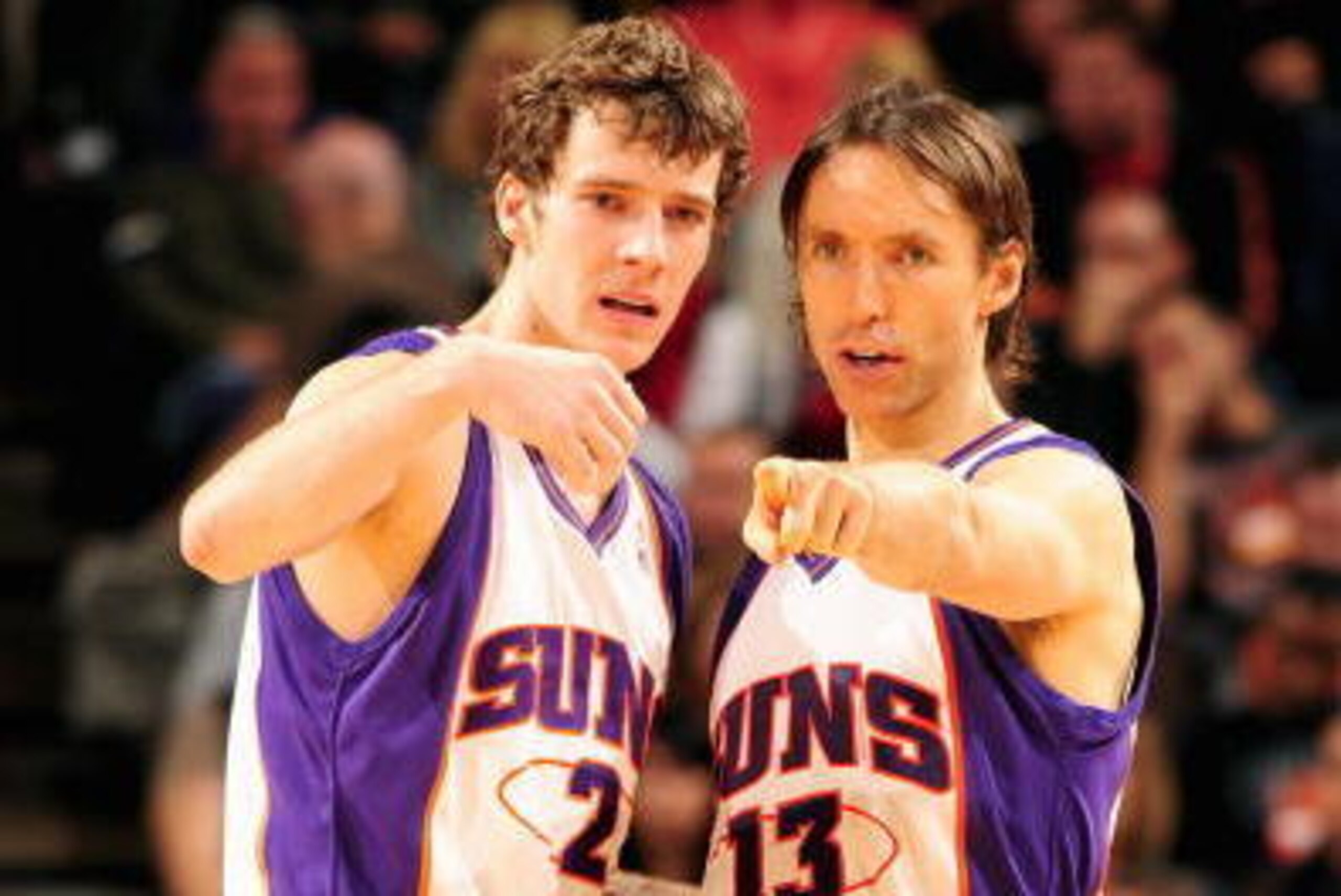 PHOENIX - DECEMBER 15:  Goran Dragic #2 and Steve Nash #13 of the Phoenix Suns discuss a play during the game against the San Antonio Spurs on December 15, 2009 at US Airways Center in Phoenix, Arizona.  The Suns won 116-104.  NOTE TO USER: User expressly