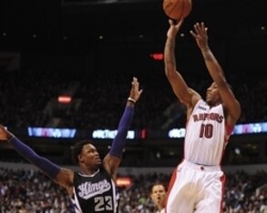 Oct 5, 2014; Vancouver, British Columbia, CAN; Toronto Raptors guard DeMar DeRozan (10) shoots the ball against Sacramento Kings guard Ben McLemore (23) during the first half at Rogers Arena. Mandatory Credit: Anne-Marie Sorvin-USA TODAY Sports