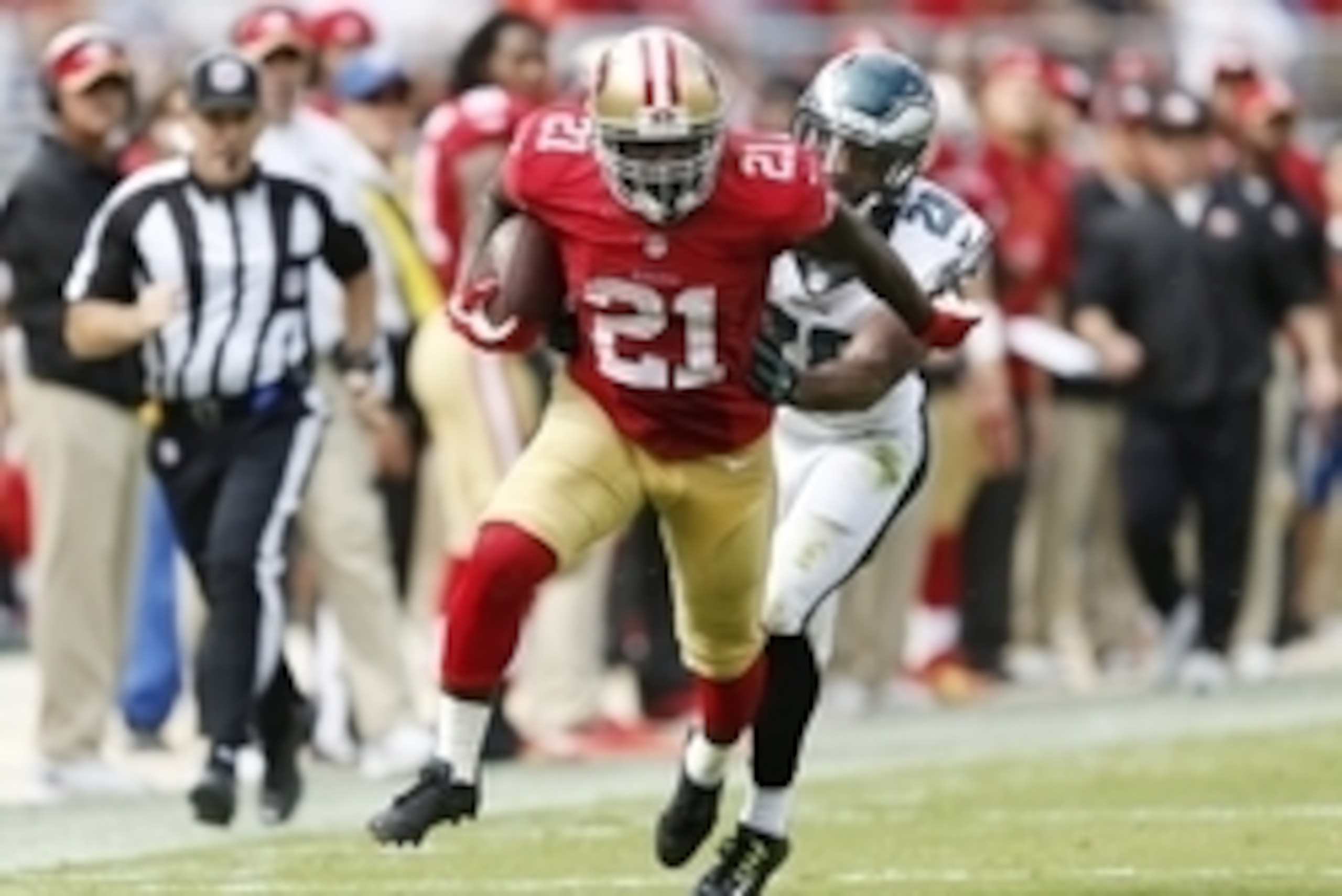 Sep 28, 2014; Santa Clara, CA, USA; San Francisco 49ers running back Frank Gore (21) breaks for 55 yard touchdown on a pass from 49ers quarterback Colin Kaepernick (7), not in picture, against the Philadelphia Eagles during the second quarter at Levi's St