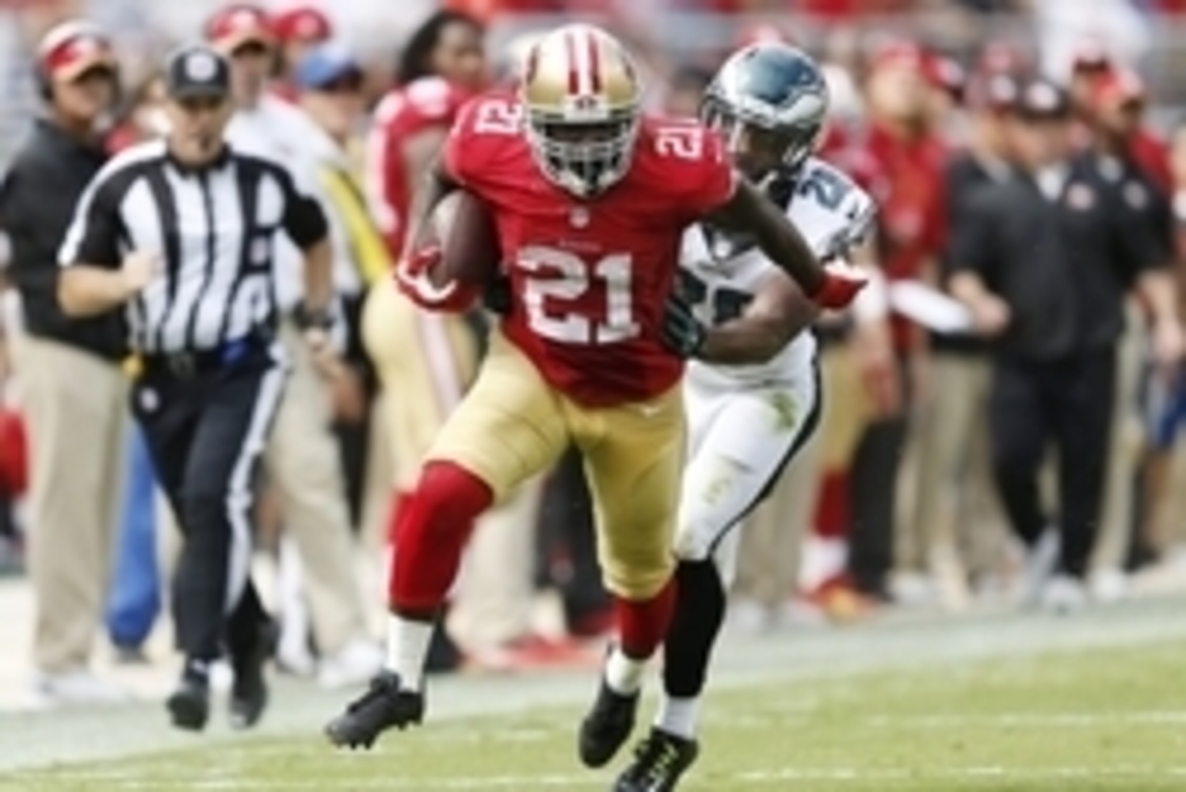 Sep 28, 2014; Santa Clara, CA, USA; San Francisco 49ers running back Frank Gore (21) breaks for 55 yard touchdown on a pass from 49ers quarterback Colin Kaepernick (7), not in picture, against the Philadelphia Eagles during the second quarter at Levi's St