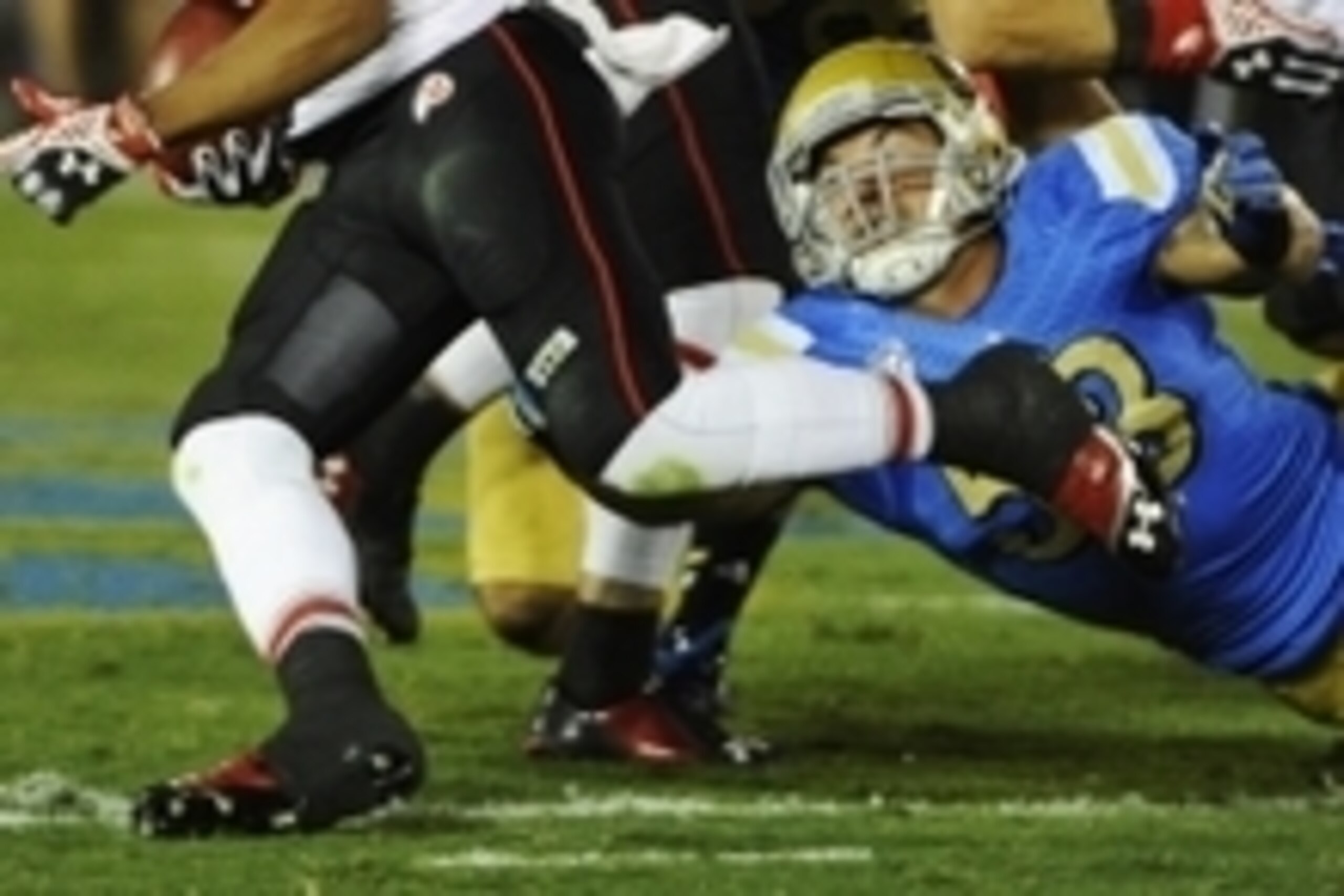 Oct 4, 2014; Pasadena, CA, USA; Utah Utes wide receiver Kaelin Clay (8) runs past UCLA Bruins linebacker Ryan Hofmeister (53) during second half action at the Rose Bowl. Mandatory Credit: Robert Hanashiro-USA TODAY Sports