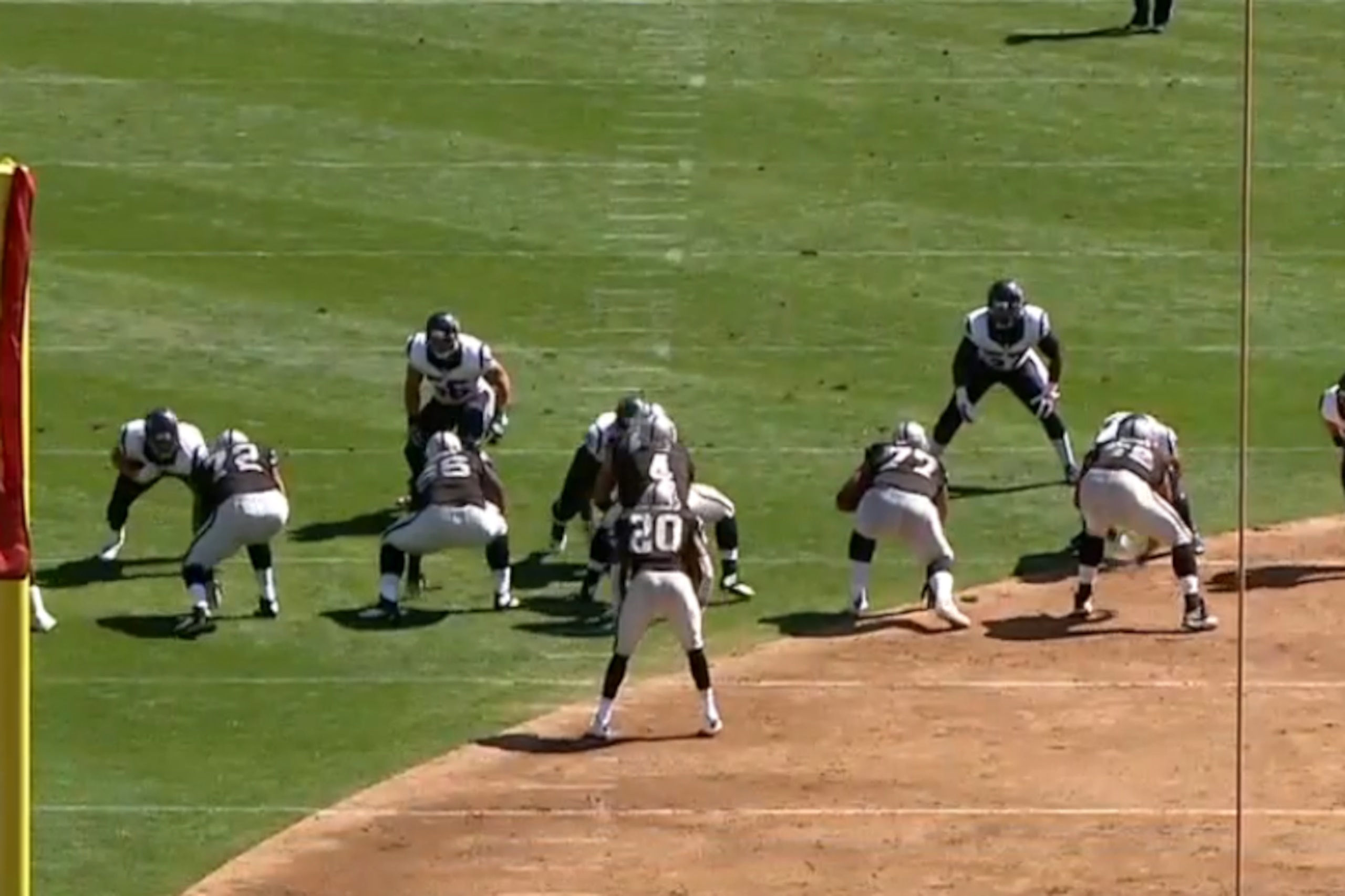 Derek Carr takes the snap.