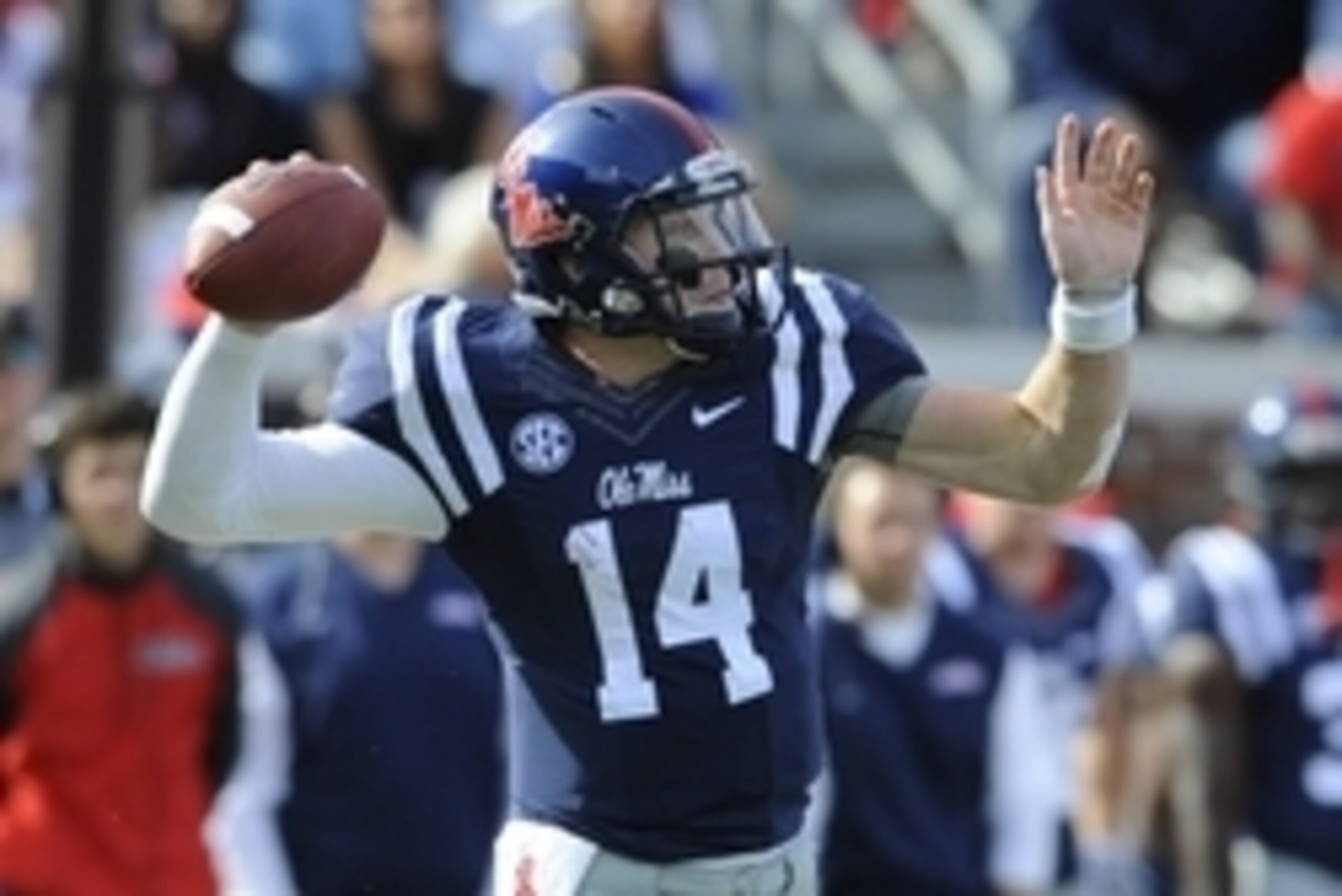 Oct 4, 2014; Oxford, MS, USA; Mississippi Rebels quarterback Bo Wallace (14) passes during the first half against Alabama Crimson Tide at Vaught-Hemingway Stadium. Mandatory Credit: Christopher Hanewinckel-USA TODAY Sports