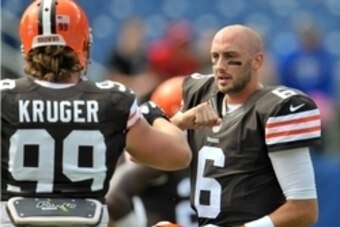 Oct 5, 2014; Nashville, TN, USA; Cleveland Browns quarterback Brian Hoyer (6) with teammate Cleveland outside linebacker Paul Kruger (99) during warm-ups prior to the game against the Tennessee Titans at LP Field. Mandatory Credit: Jim Brown-USA TODAY Spo