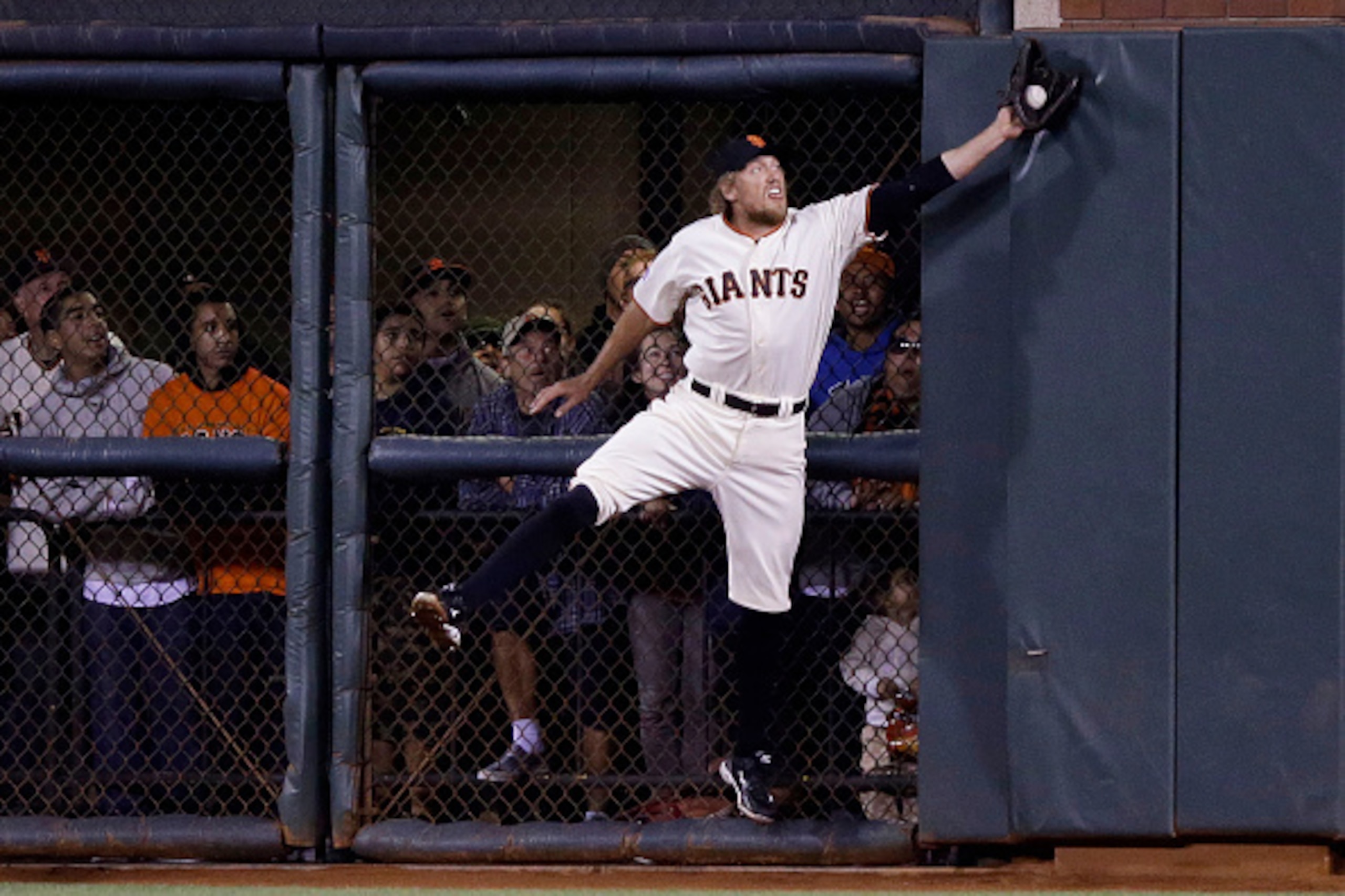 SAN FRANCISCO, CA - OCTOBER 07:  Hunter Pence #8 of the San Francisco Giants catches a ball hit by Jayson Werth #28 of the Washington Nationals for an out in the sixth inning during Game Four of the National League Division Series at AT&T Park on October