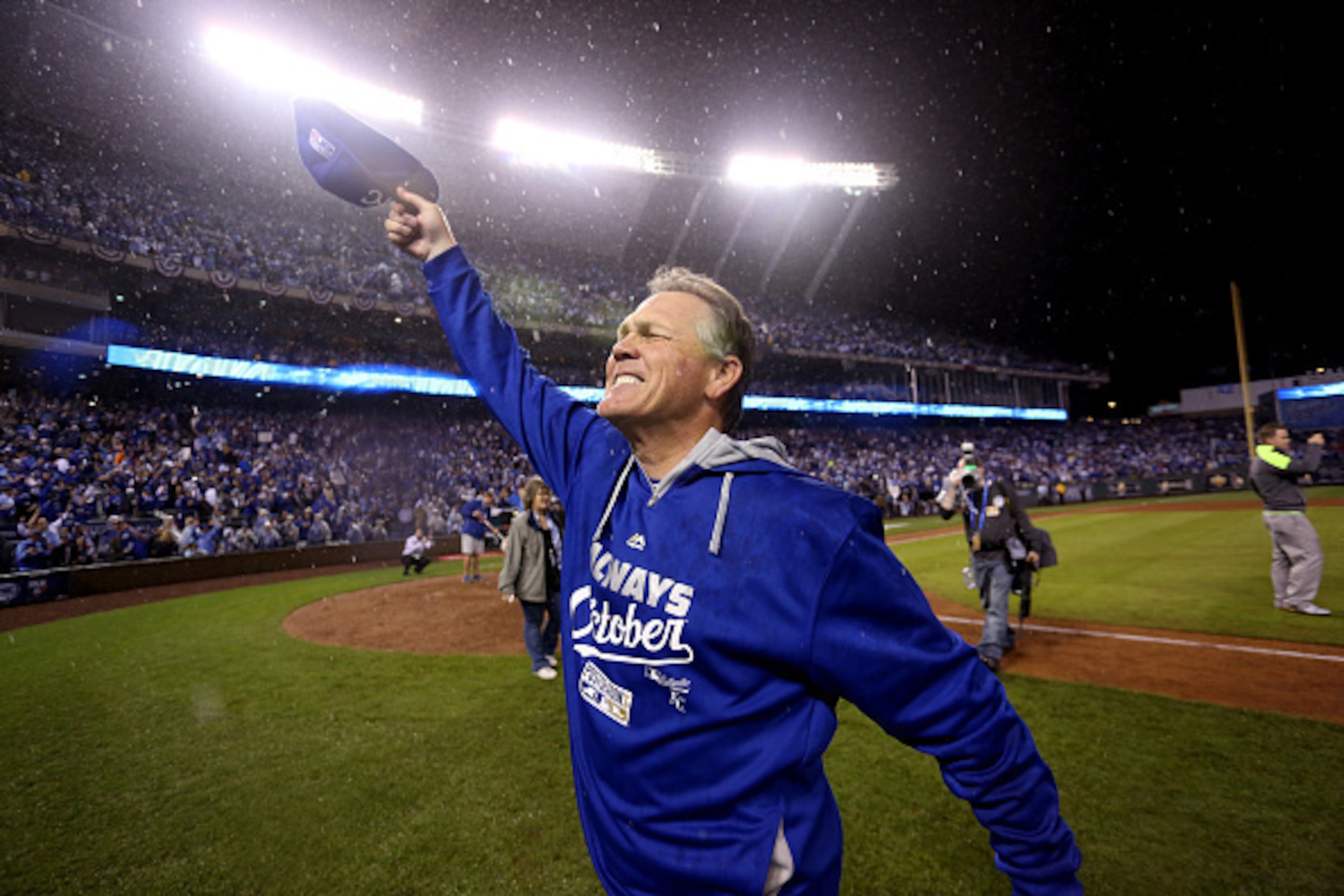 KANSAS CITY, MO - OCTOBER 05:  Manager Ned Yost #3 the Kansas City Royals celebrates on the field after defeating the Los Angeles Angels 8-3 to sweep the series in Game Three of the American League Division Series at Kauffman Stadium on October 5, 2014 in