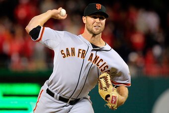 WASHINGTON, DC - OCTOBER 04:  Hunter Strickland #60 of the San Francisco Giants throws a pitch in the eighteenth inning against the Washington Nationals during Game Two of the National League Division Series at Nationals Park on October 4, 2014 in Washing