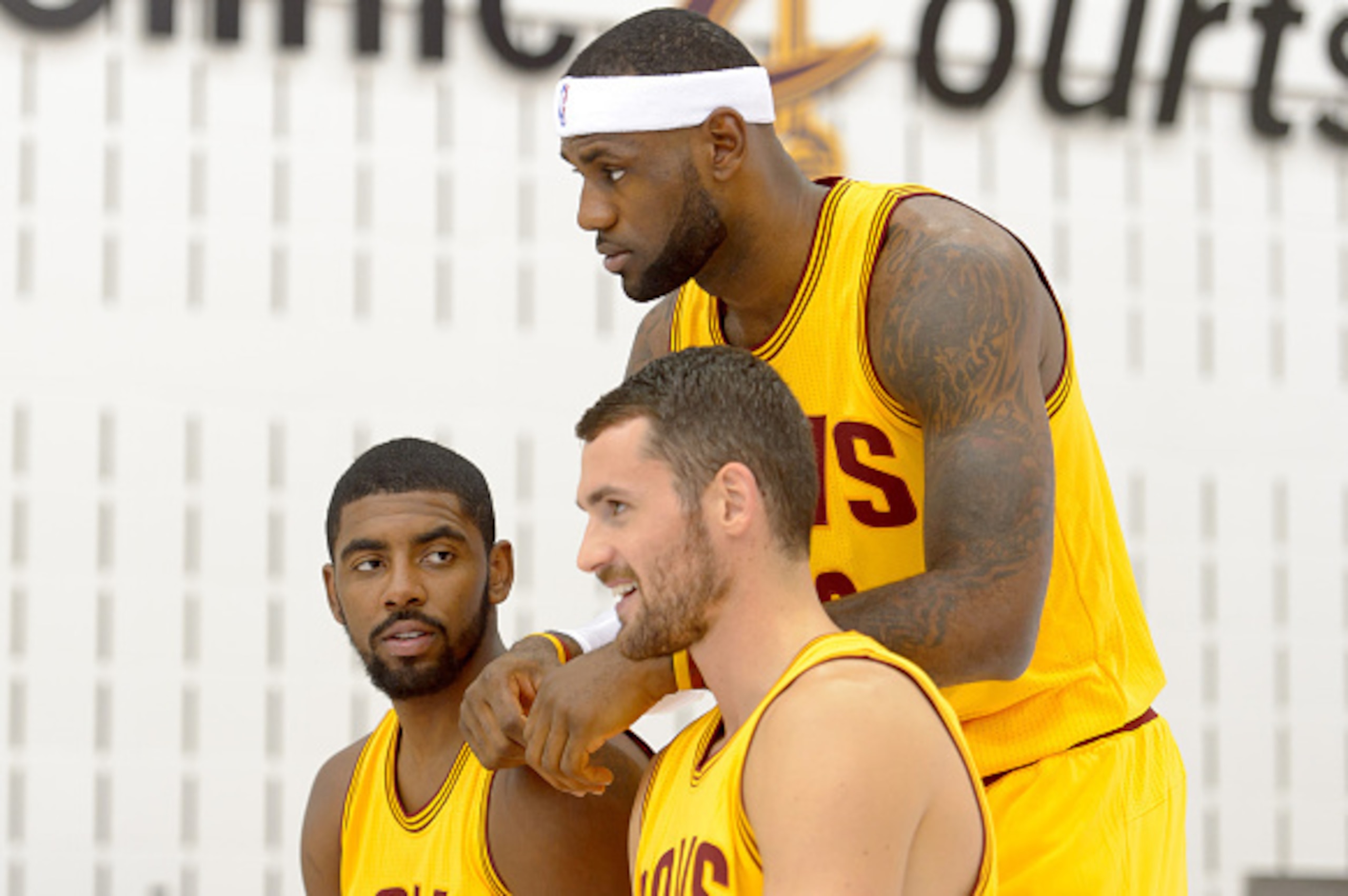 INDEPENDENCE, OH - SEPTEMBER 26: Kevin Love #0 Kyrie Irving #2 and LeBron James #23 of the Cleveland Cavaliers pose for a photo during media day at Cleveland Clinic Courts on September 26, 2014 in Independence, Ohio. (Photo by Jason Miller/Getty Images)