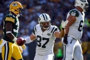 Sep 14, 2014; Green Bay, WI, USA; New York Jets wide receiver Eric Decker (87) signals a first down after making a catch in the second quarter against the Green Bay Packers at Lambeau Field. Mandatory Credit: Benny Sieu-USA TODAY Sports