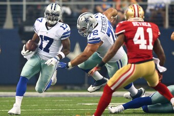 ARLINGTON, TX - SEPTEMBER 07:  Dwayne Harris #17 of the Dallas Cowboys returns a kickoff as Antoine Bethea #41 of the San Francisco 49ers pursues in the first half at AT&T Stadium on September 7, 2014 in Arlington, Texas.  (Photo by Ronald Martinez/Getty 