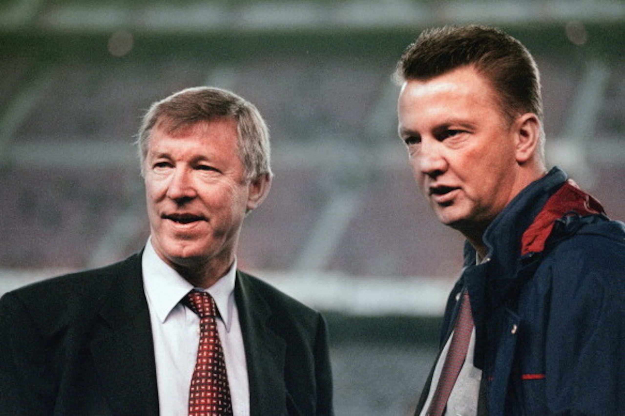 BARCELONA, SPAIN - NOVEMBER 25: Manchester United manager Alex Ferguson (l) and Barcelona coach Louis Van Gaal chat before the UEFA Champions League match between Barcelona and Manchester United at the Nou Camp in Barcelona, Spain.  (Photo by Shaun Botter